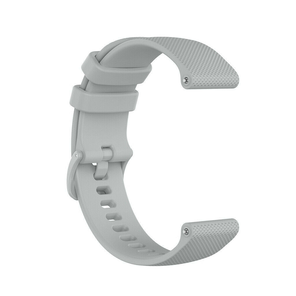 Ein hellgraues Uhrenarmband, das wie ein C geformt ist. Es hat eine Schnalle, Löcher zur Verstellung und strukturierte Enden zur Befestigung.