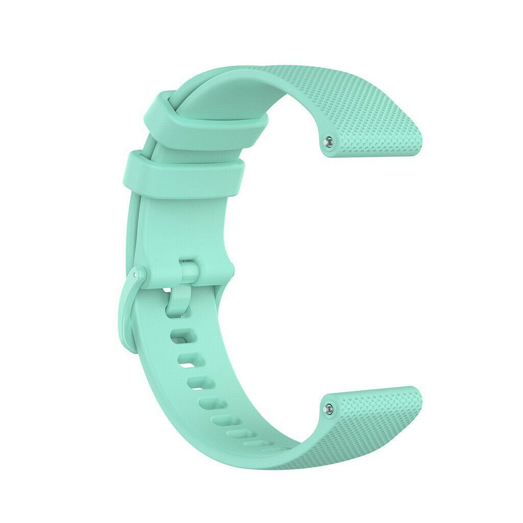 Ein helltürkisfarbenes Uhrenarmband, das in einer "C"-Form gebogen ist. Es hat eine Schnalle und mehrere Verstelllöcher.