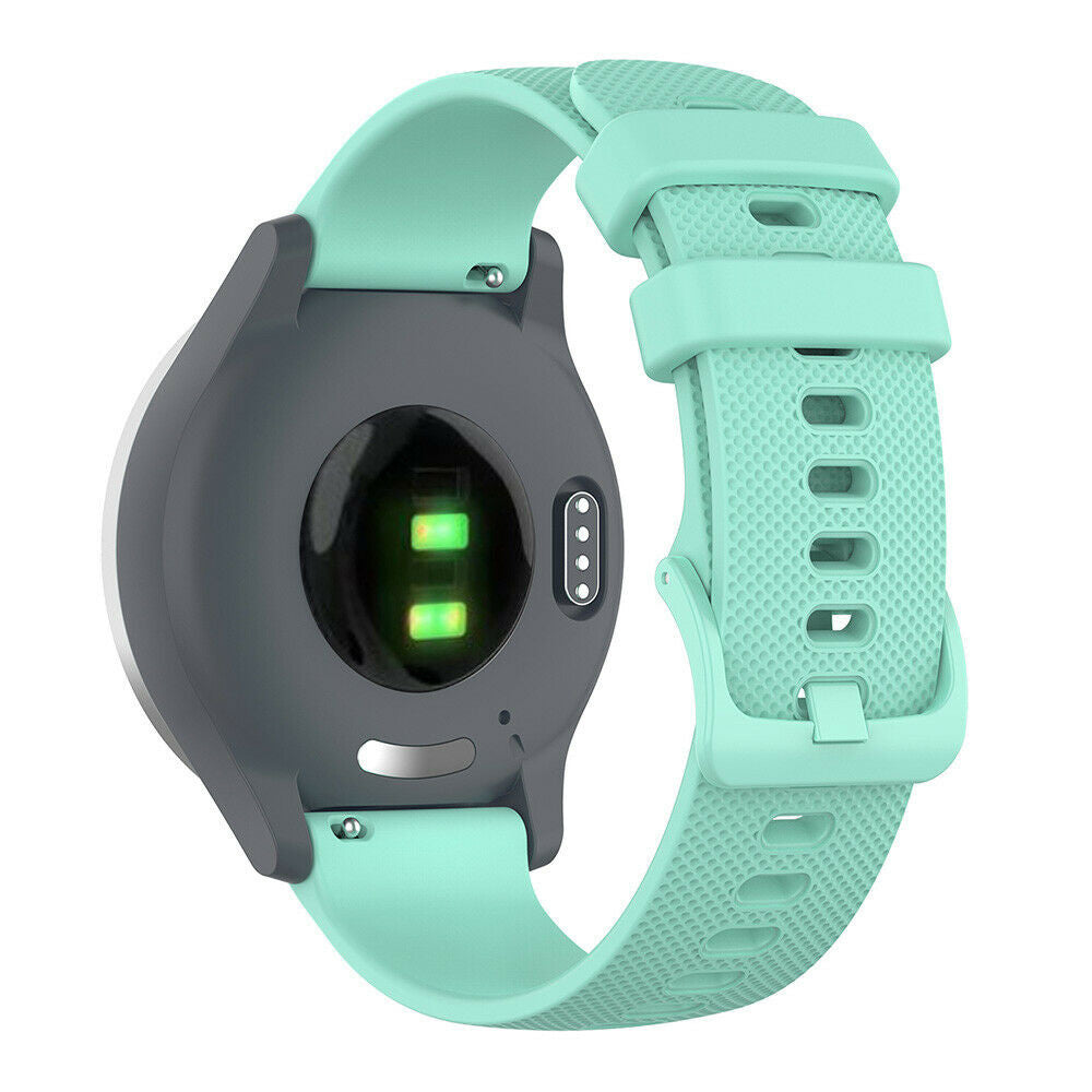 Eine Smartwatch mit grauem Rücken und tealfarbenem Armband. Die Rückseite hat Sensoren, das Armband ist strukturiert.