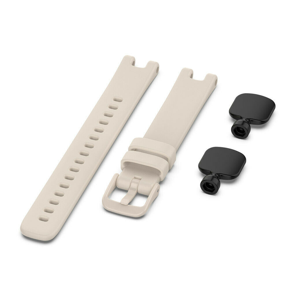 Beige Uhrenarmbänder und zwei schwarze Stifte auf weißem Hintergrund. Die Armbänder sind in verschiedenen Abschnitten. Die Stifte sind klein und quadratisch.