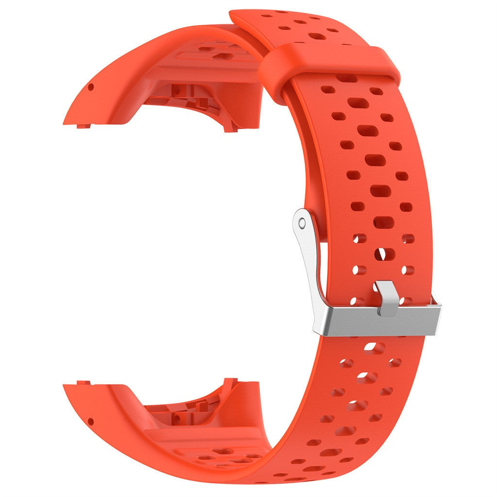 Oranges Uhrenarmband mit Perforationen, silberne Schnalle. Das Armband ist gebogen, seine Innenseite zeigend. Weißer Hintergrund.