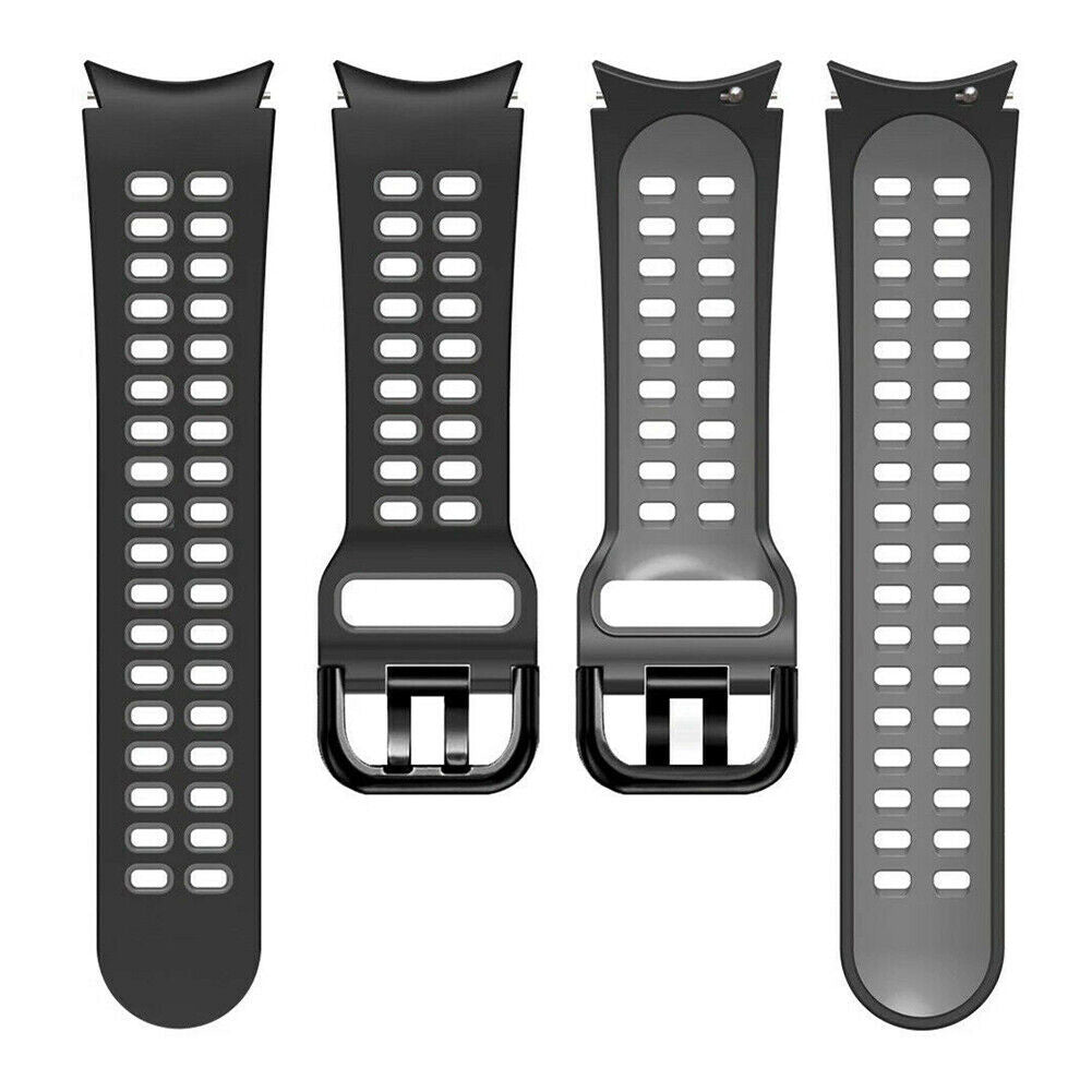 Vier schwarze Uhrenarmbänder sind vertikal angeordnet. Jeder Riemen hat eine Reihe von Löchern und eine Schnalle. Die Riemen sind auf weißem Hintergrund.