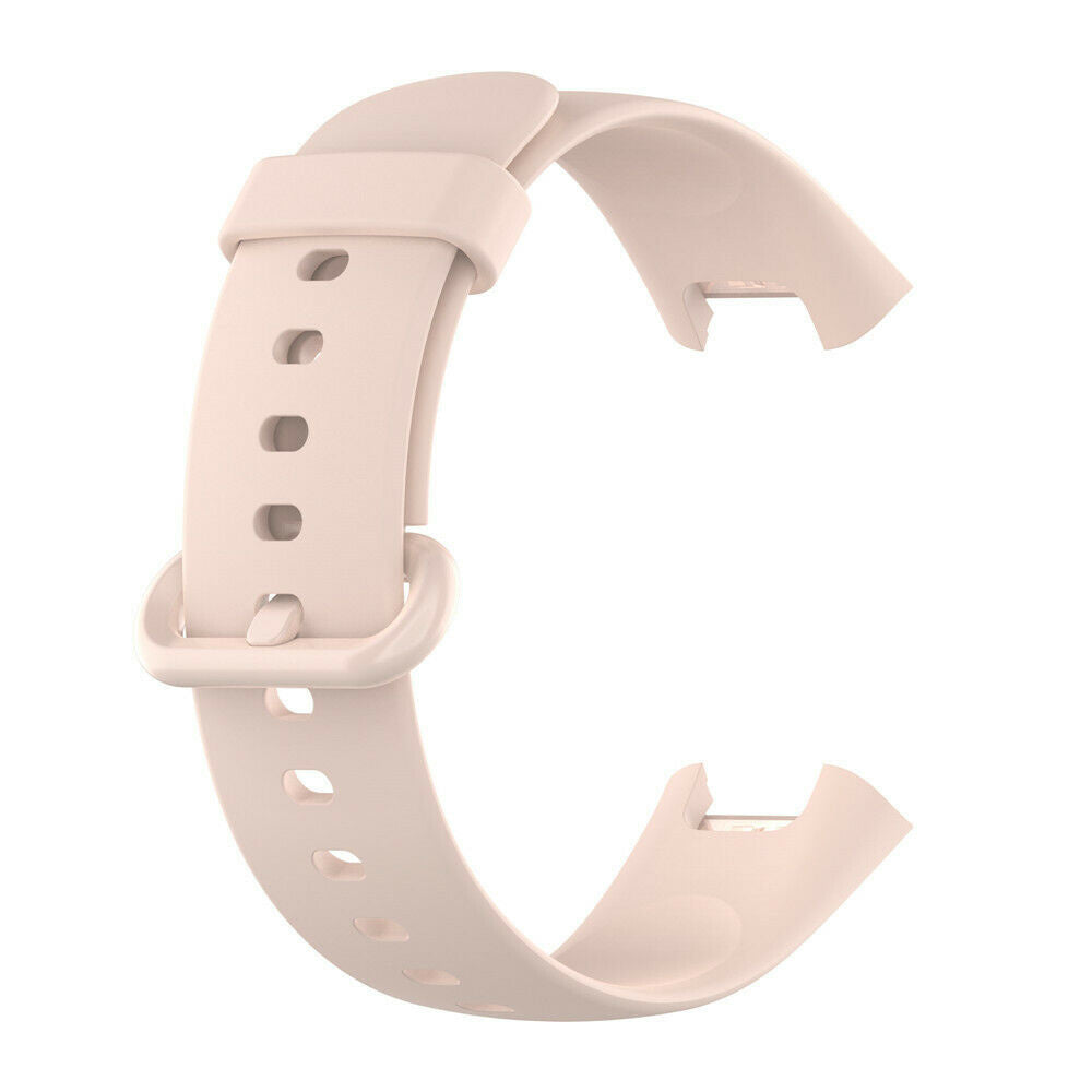Ein hellrosa Uhrenarmband ist abgebildet. Es hat eine Schnalle und mehrere Löcher. Das Band ist gebogen, mit einem Verschluss am Ende.
