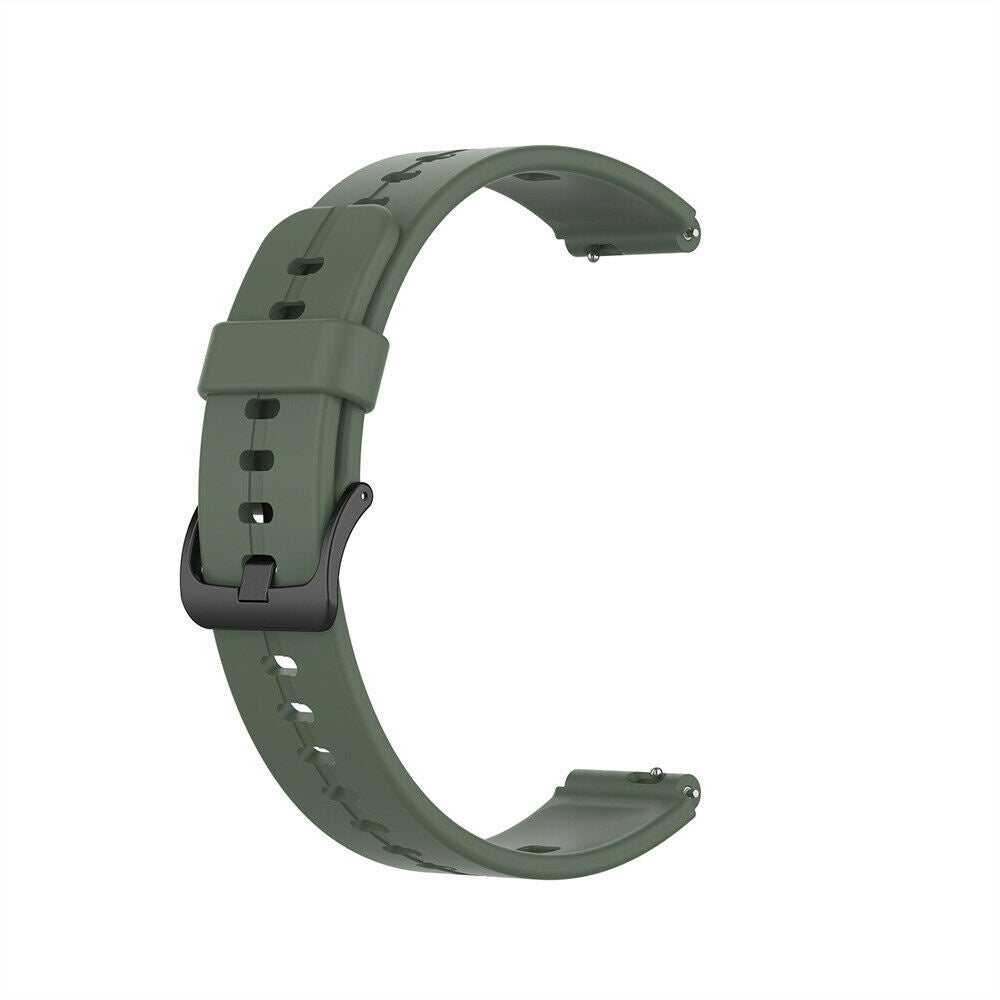 Ein grünes Smartwatch-Armband mit schwarzer Schnalle vor weißem Hintergrund. Das Armband ist gebogen und im Fokus.