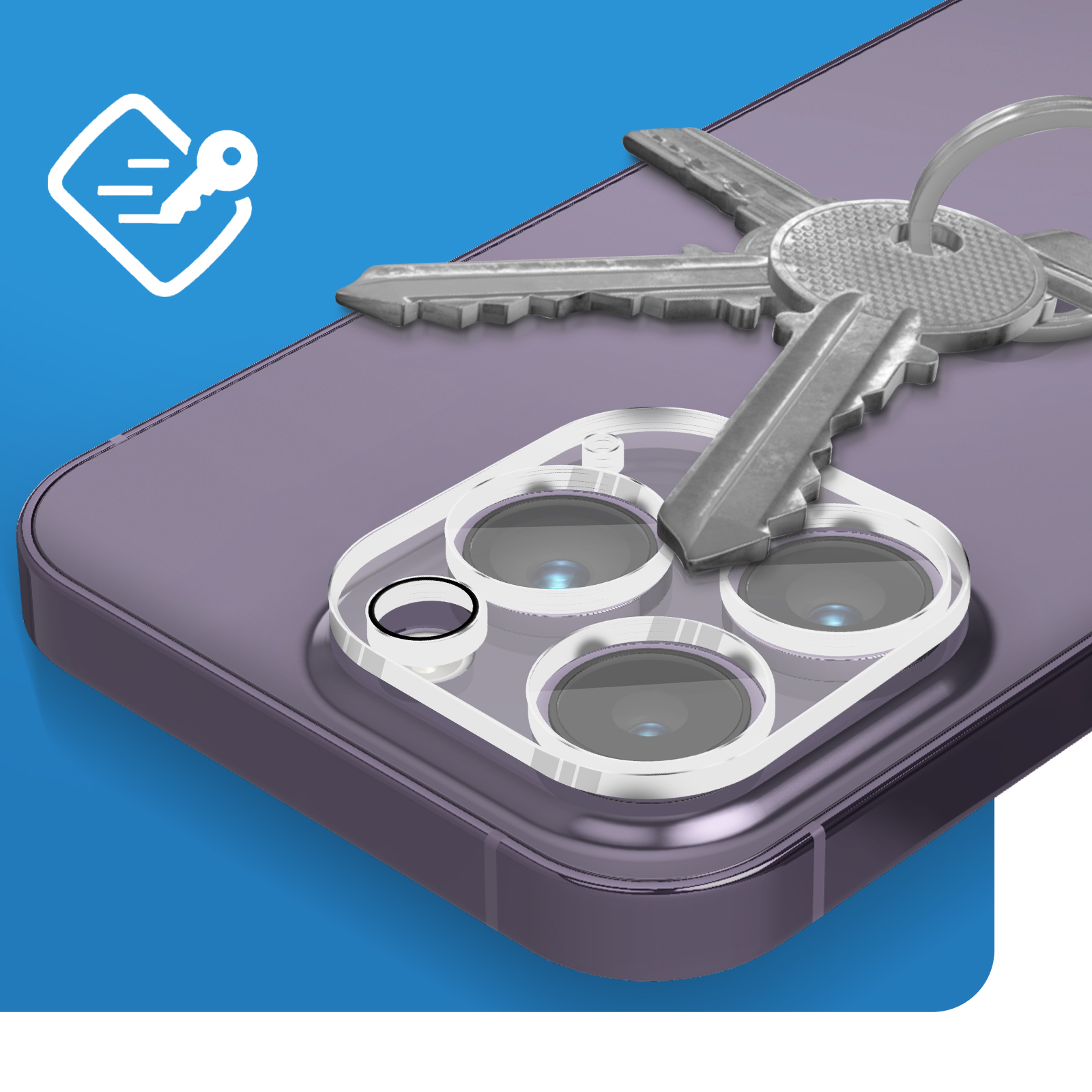 Un teléfono con llaves encima. Es visible un protector de cámara para el teléfono. El fondo es azul.
