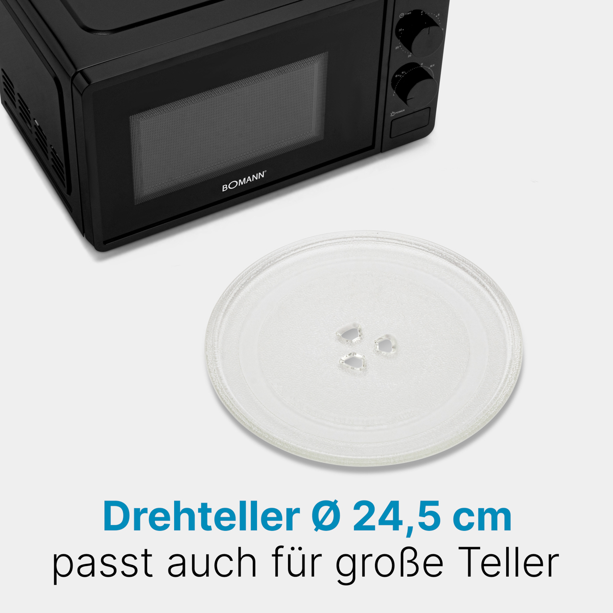 Czarna kuchenka mikrofalowa ze szklanym talerzem. Tekst: Drehteller Ø 24,5 cm passt auch für große Teller.