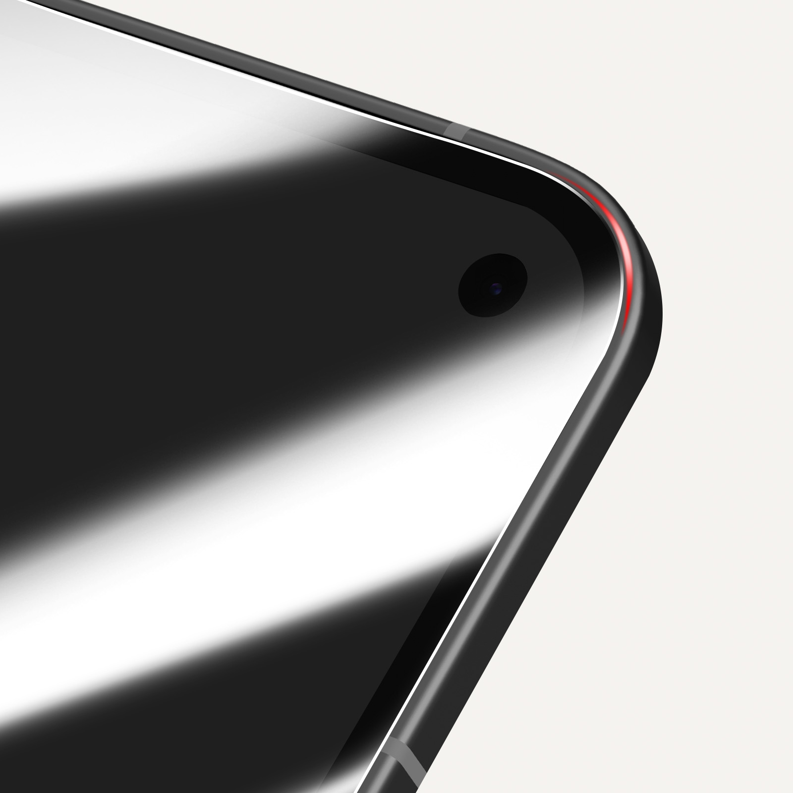 Primo piano di un angolo di smartphone nero con fotocamera. Lo schermo riflette la luce, e un accento rosso è visibile.
