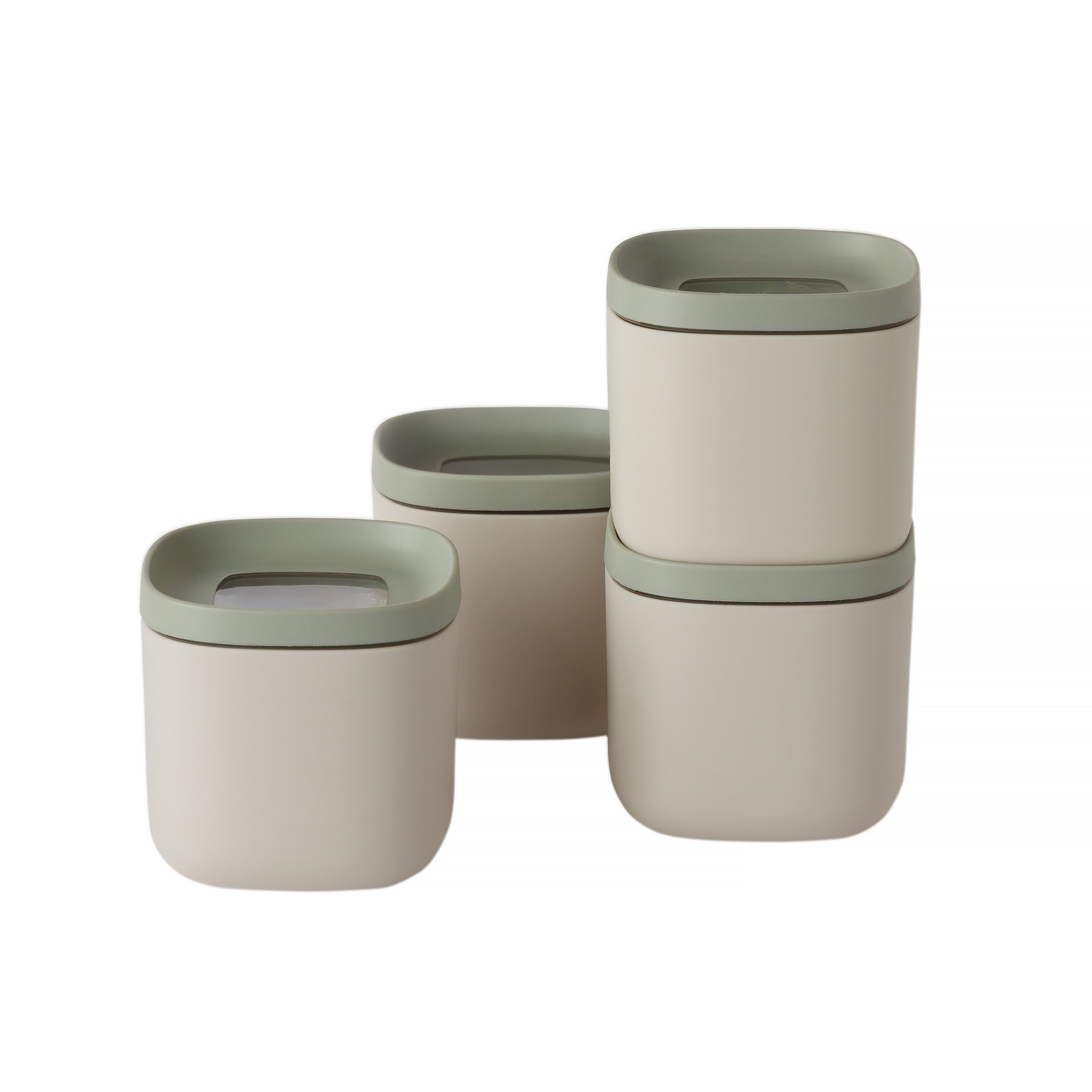 Four stacked containers with lids. The containers are beige, the lids are green. The background is white.