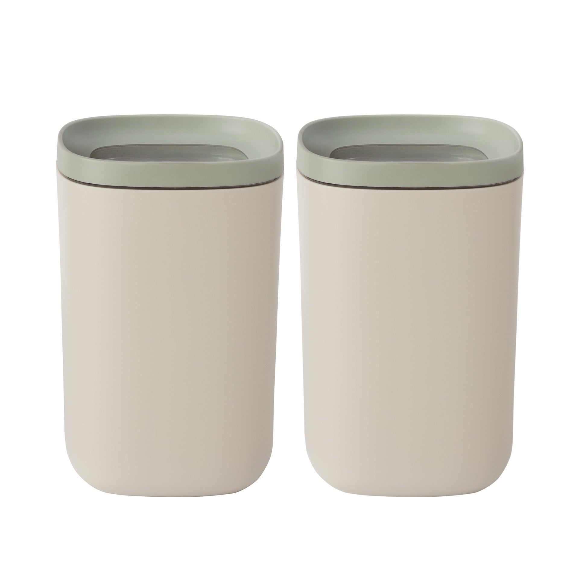 Two cream-colored containers with rounded corners and green lids are shown on a white background.