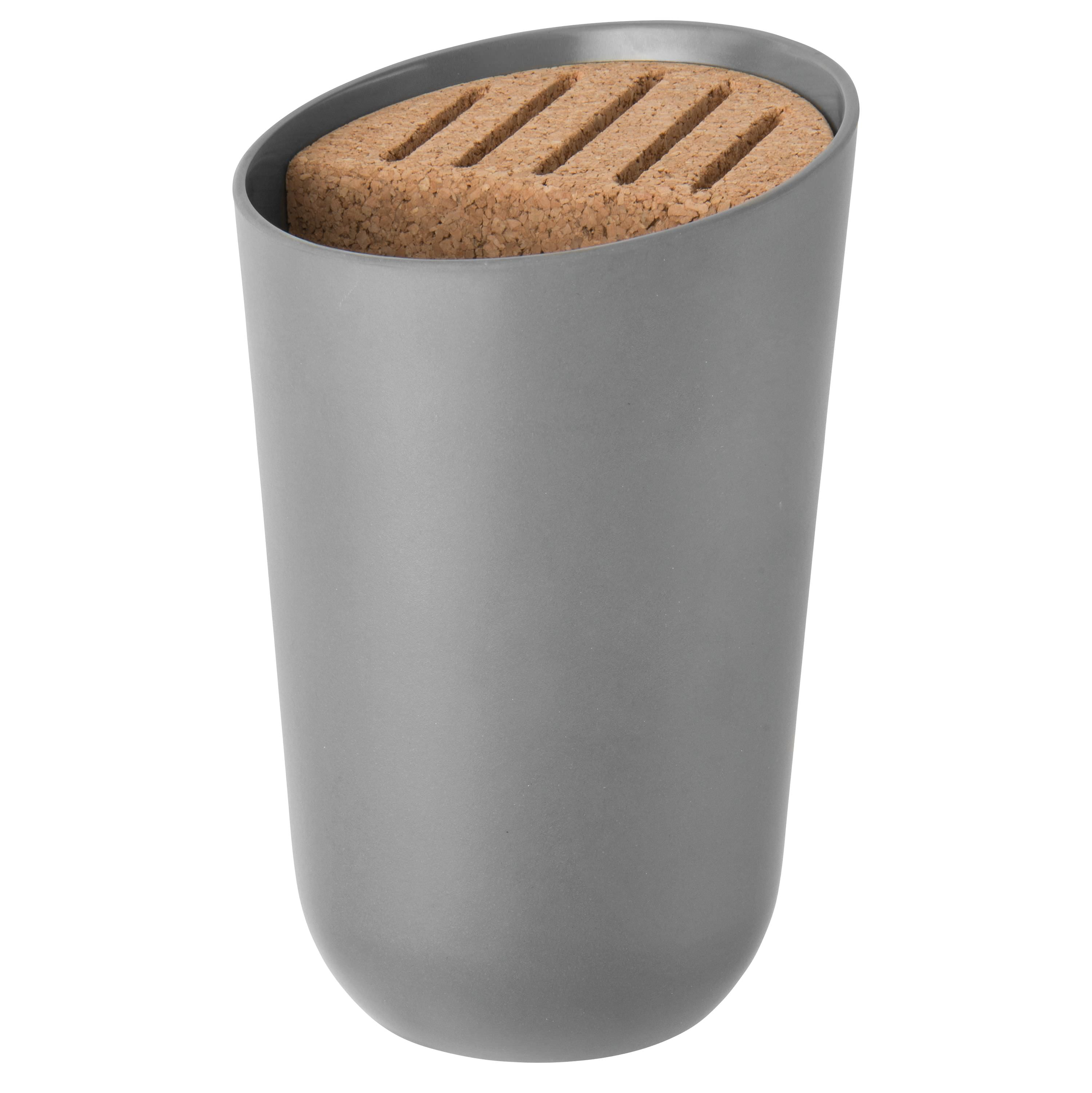 A gray knife block with a cork insert. The block is cylindrical with a slanted top. The insert has knife slots.