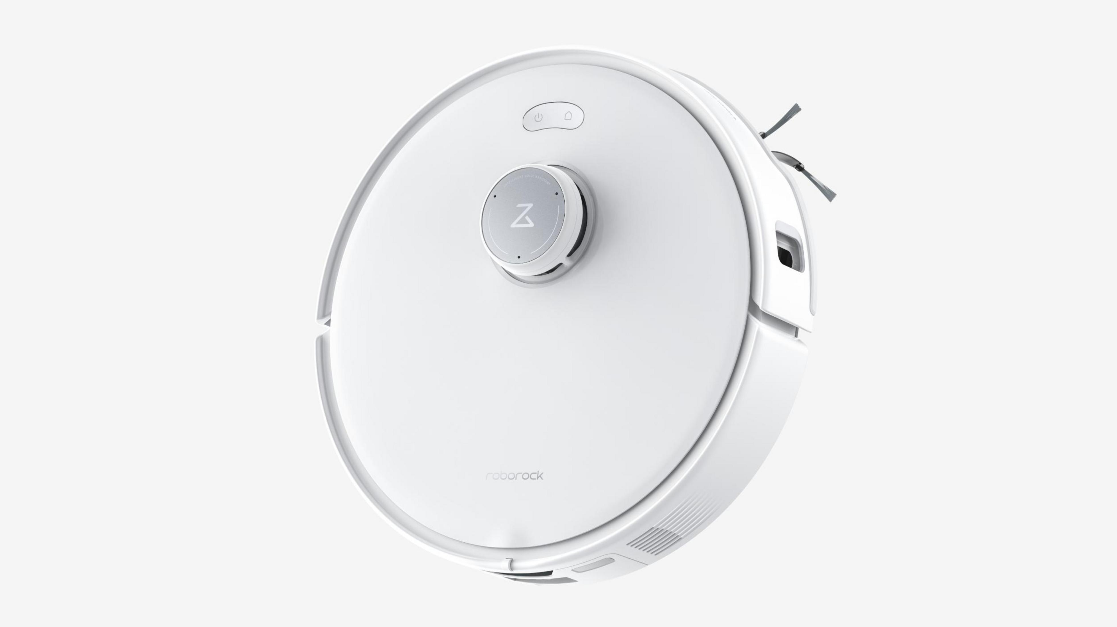 Biały odkurzacz robot Roborock. Ma okrągły kształt z przyciskami i centralnym pokrętłem. Tło jest białe.