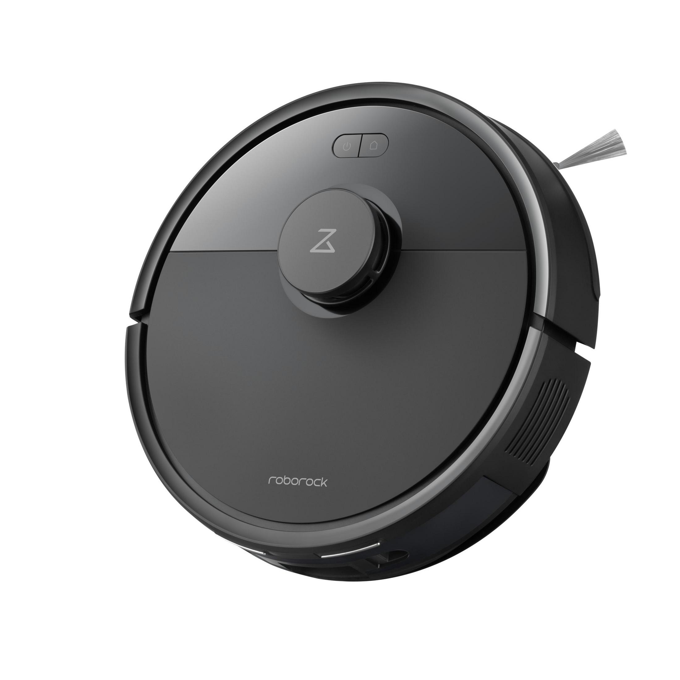 A black Roborock robot vacuum cleaner. It is round with buttons and a logo. A small brush is on the side.