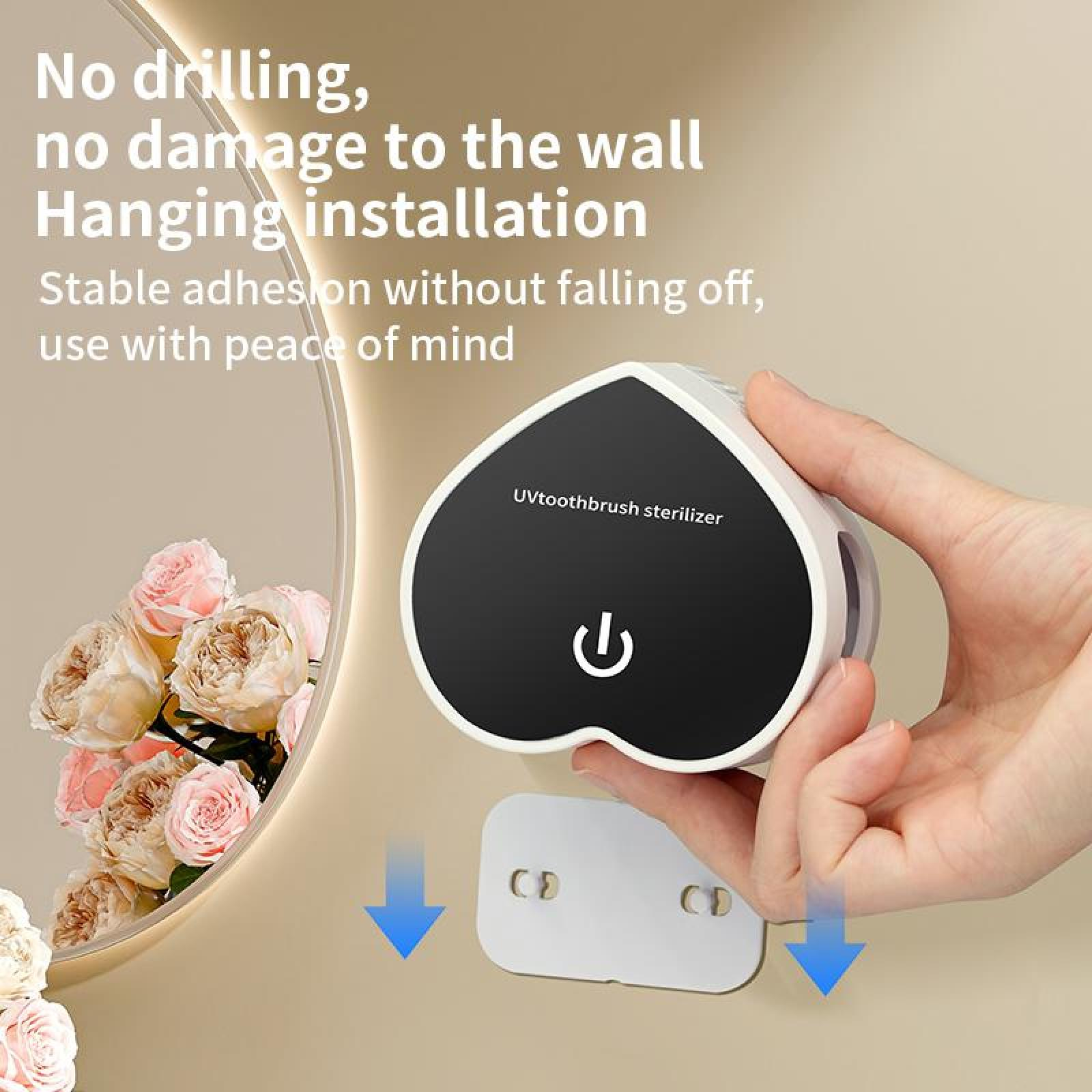 Eine Hand, die einen weißen und schwarzen Zahnbürstensterilisator hält. Text: Kein Bohren, keine Beschädigung der Wand, Hängeinstallation.