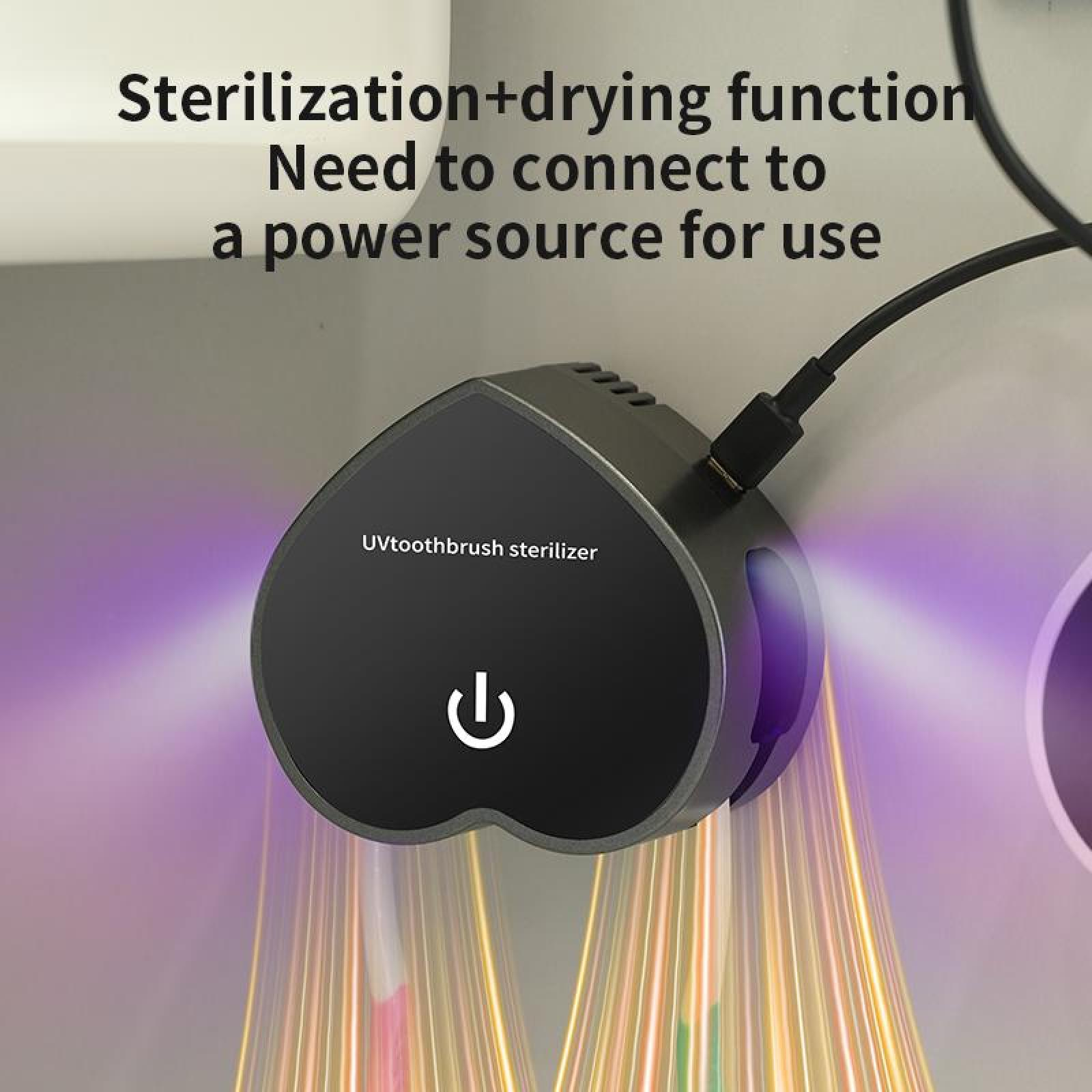 Ein schwarzer UV-Zahnbürstensterilisator ist an eine Stromquelle angeschlossen. Er hat einen Ein-Aus-Schalter und strahlt lila Licht aus.