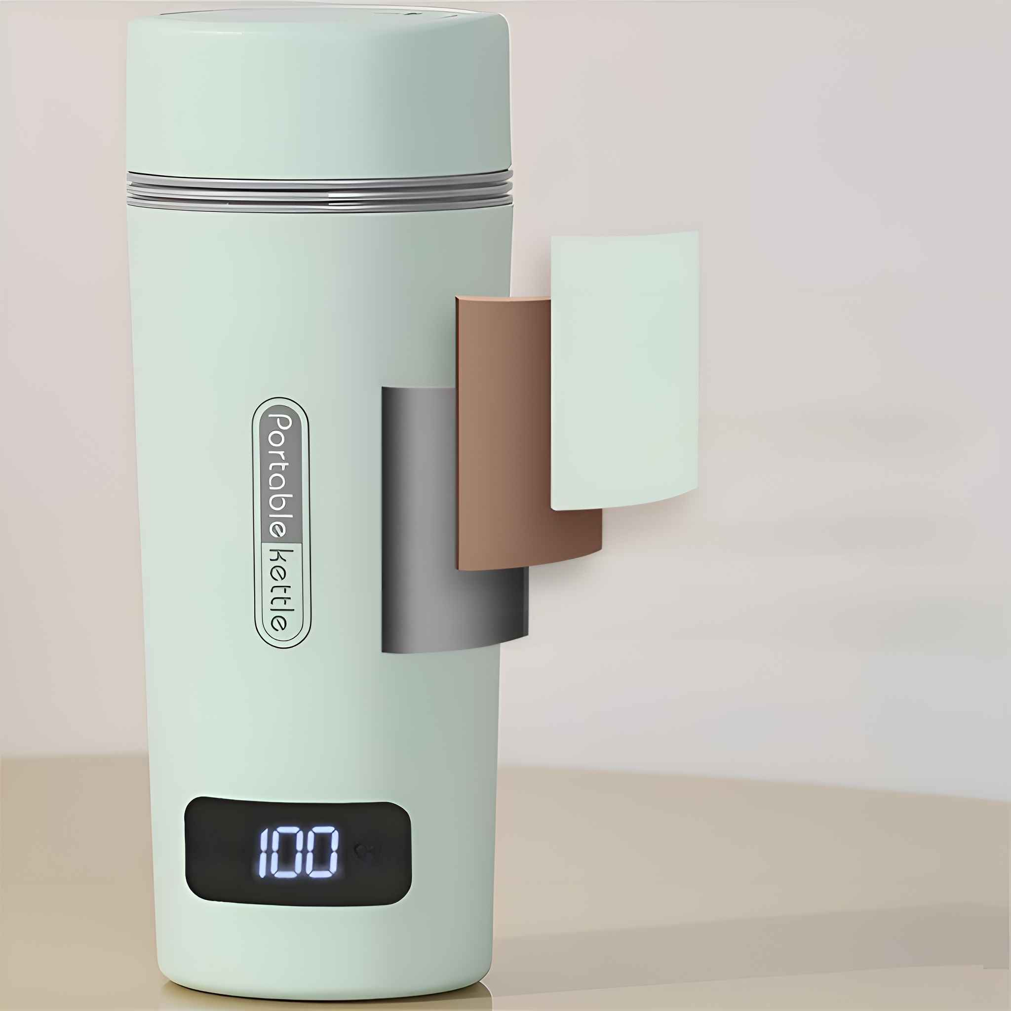 Ein mintgrüner tragbarer Wasserkocher mit digitaler Anzeige 100. Drei Farbfelder daneben.