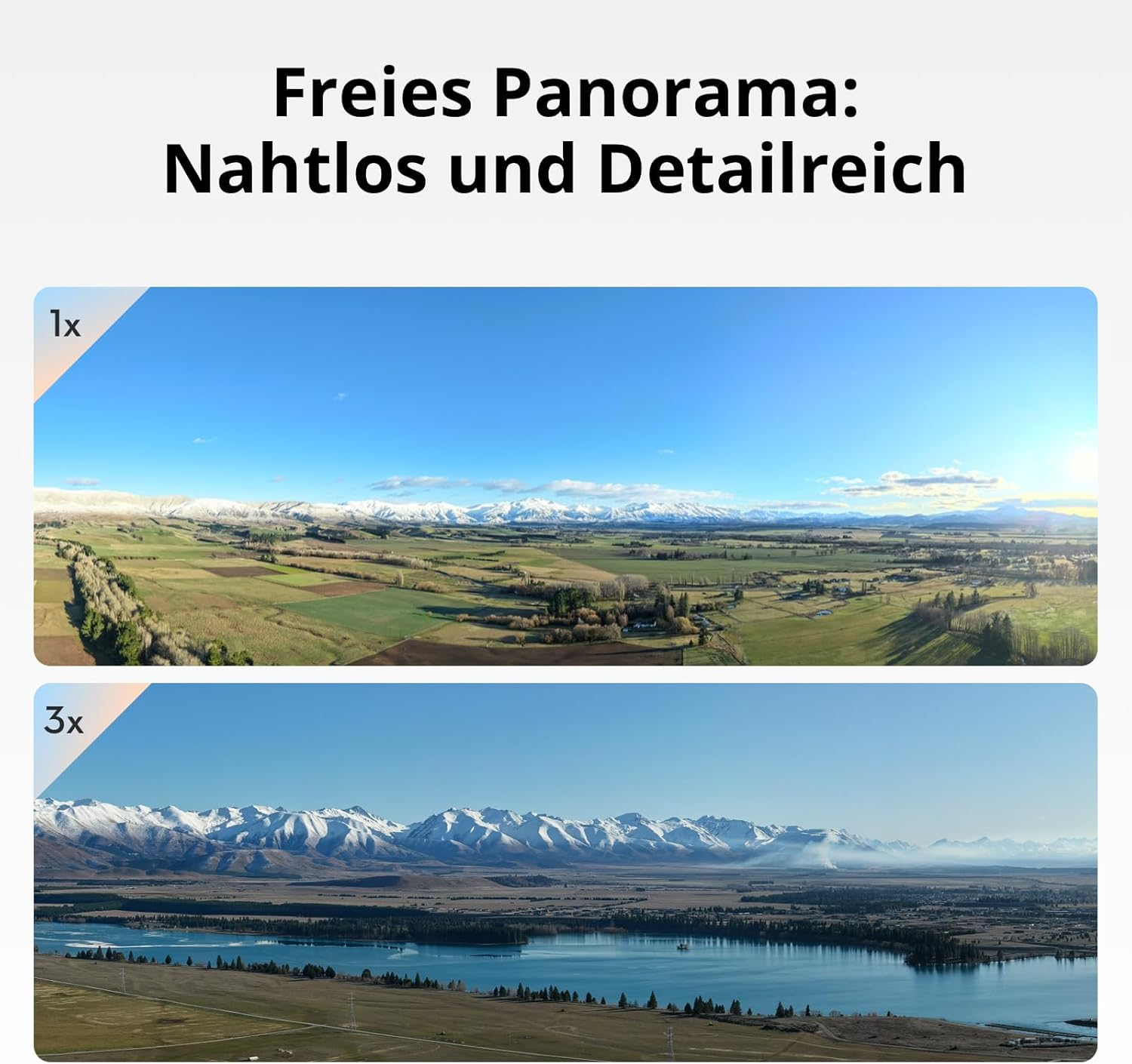 Panorama: Schneebedeckte Berge, grüne Felder und ein blauer See unter blauem Himmel.