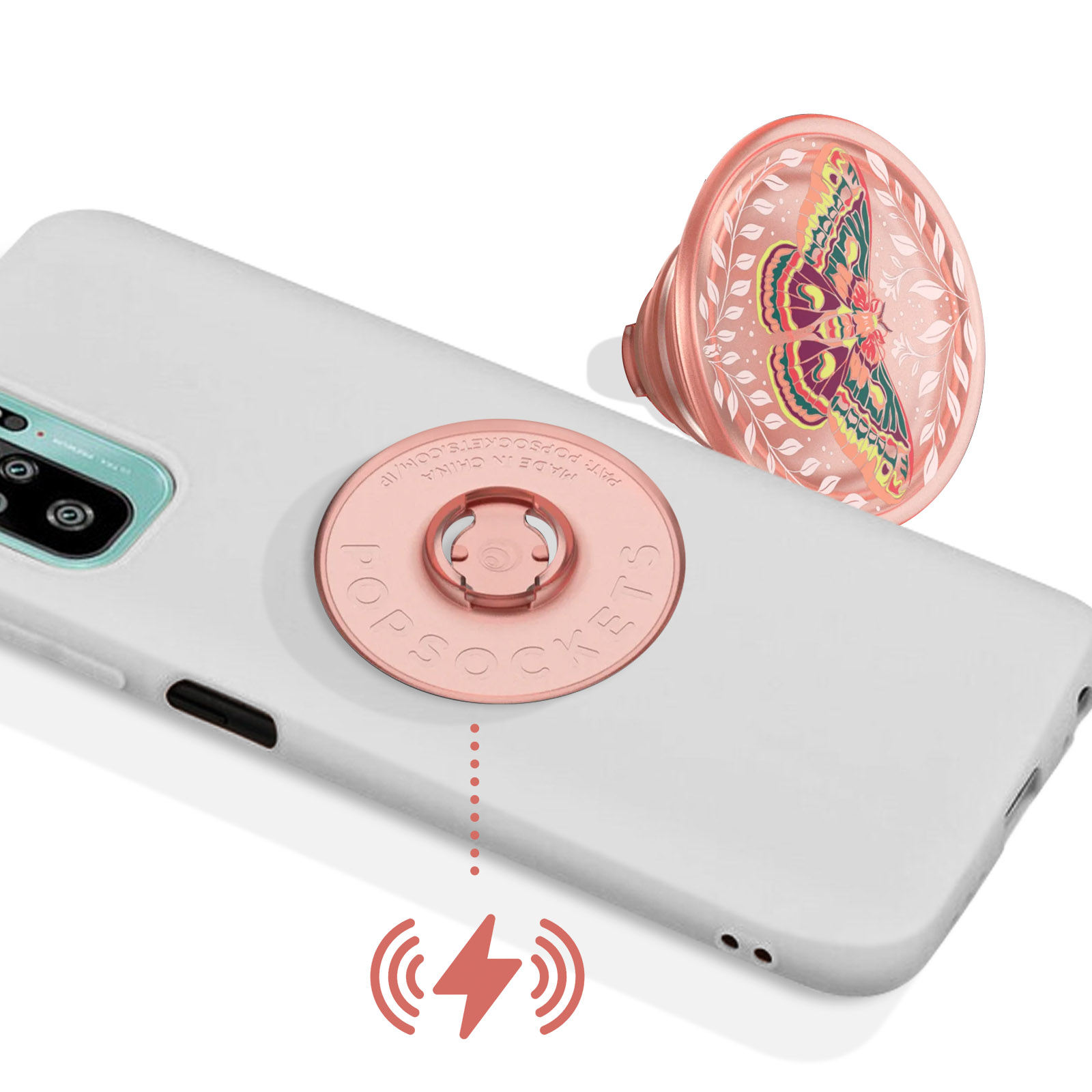 Un telefono bianco con un popsocket raffigurante una farfalla e foglie. Sotto, un simbolo di ricarica wireless.