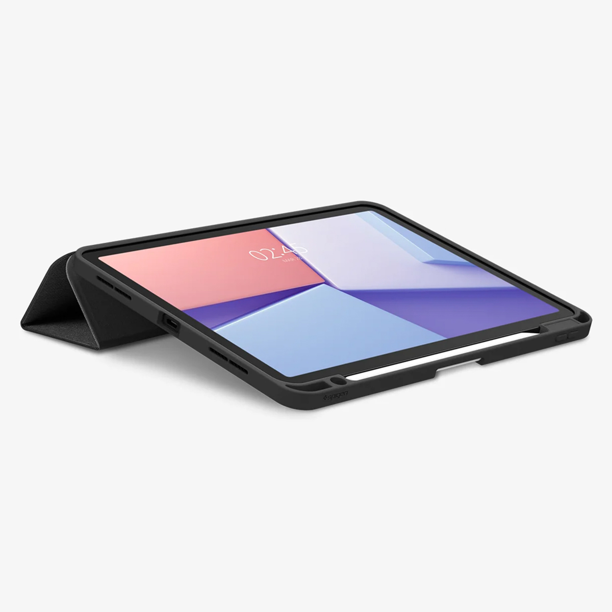 A black tablet in a case, propped up at an angle. The screen displays a colorful geometric pattern and the time.