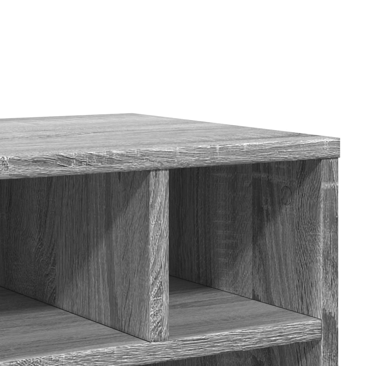 Nahaufnahme eines grauen Holzregals mit zwei Fächern. Die Holzmaserung ist sichtbar. Der Hintergrund ist weiß.