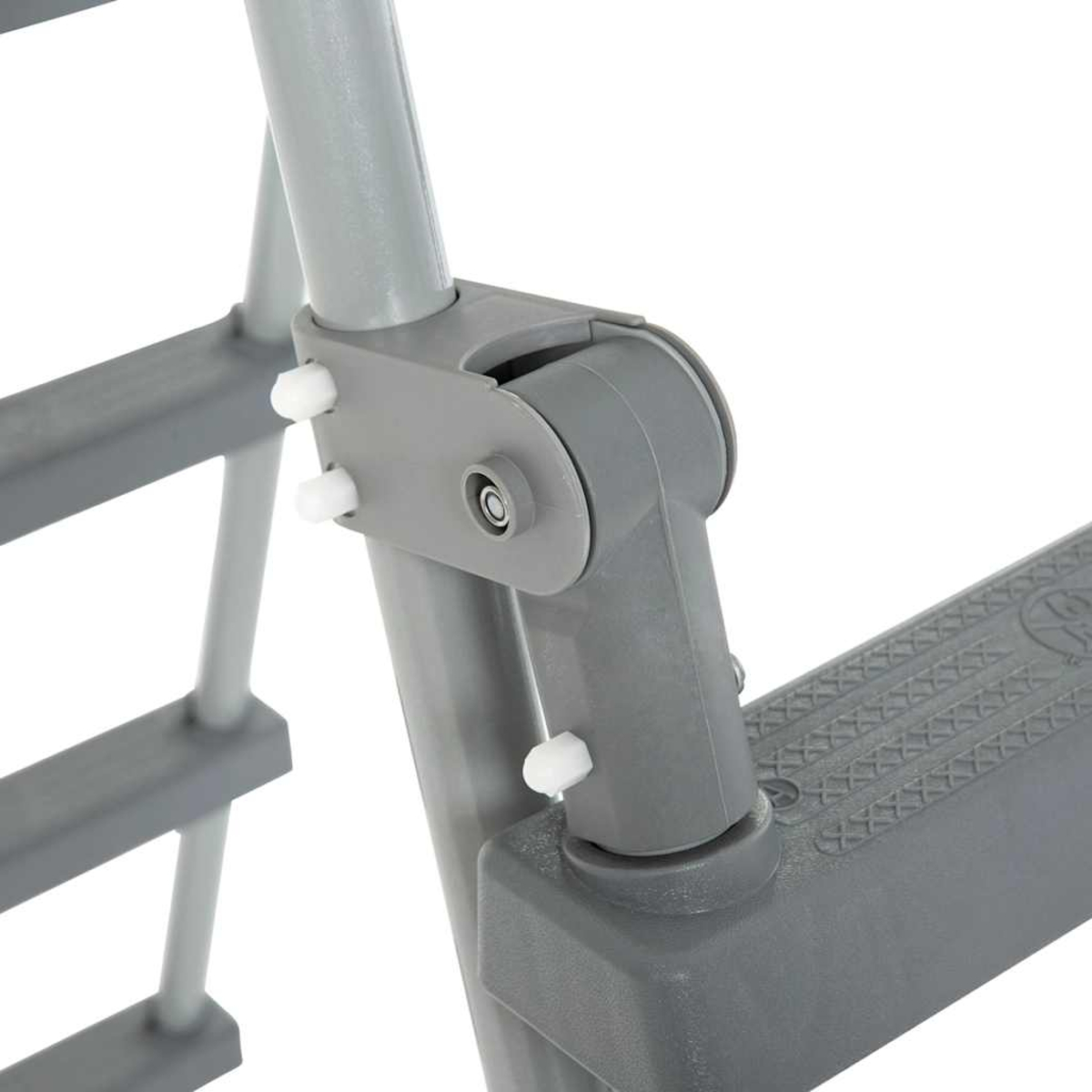 Nahaufnahme des Scharniers eines grauen Tritthockers. Sichtbar sind Stufen, Stützstangen und der Verbindungsmechanismus mit weißen Kunststoffbefestigungen.