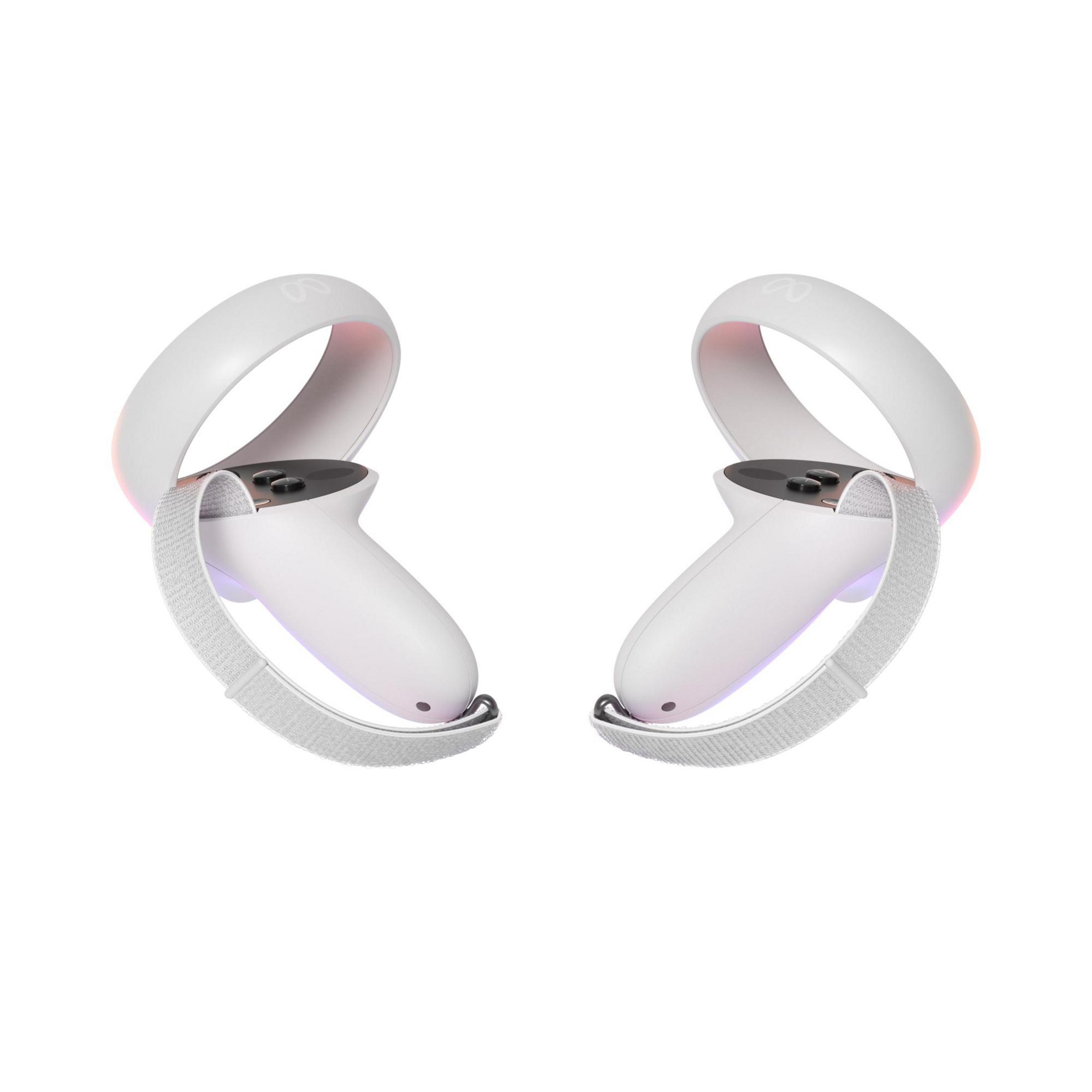 Dos controladores de realidad virtual blancos con correas grises se muestran sobre un fondo blanco. Cada controlador tiene botones y un anillo.