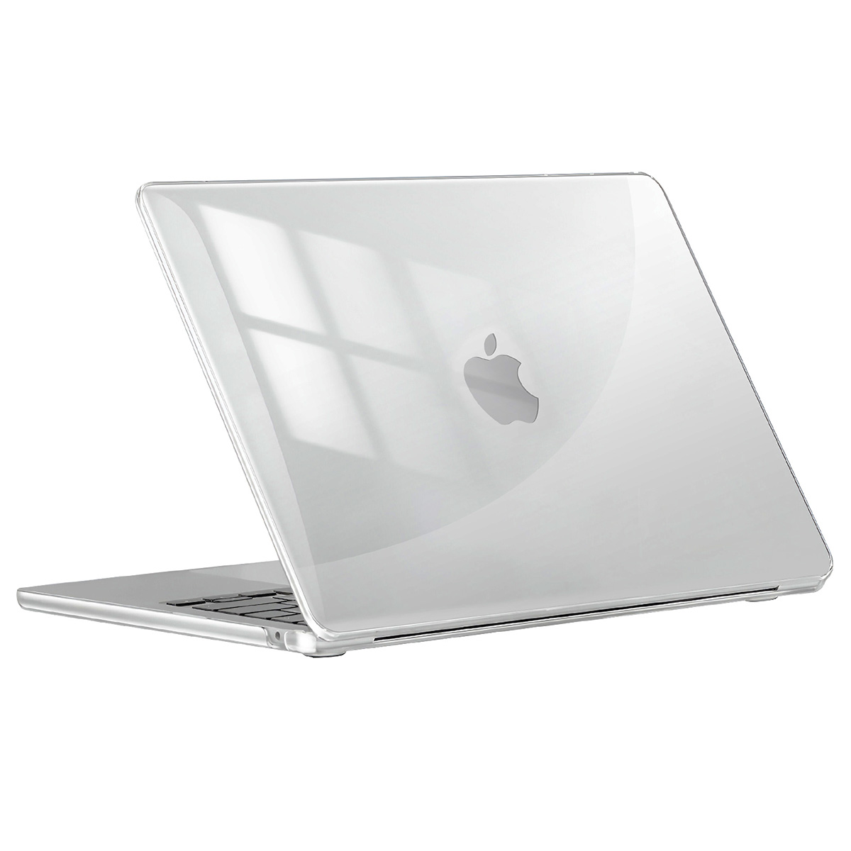 Un laptop argentato con una cover trasparente, logo Apple visibile. Lo schermo è aperto. Ci sono ombre sulla cover.