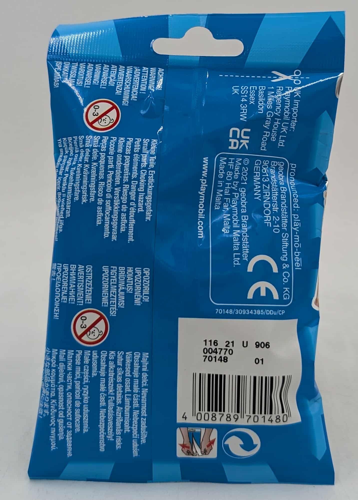 Busta di plastica blu con testo, avvertenze e codice a barre. Contiene un'avvertenza per piccole parti.