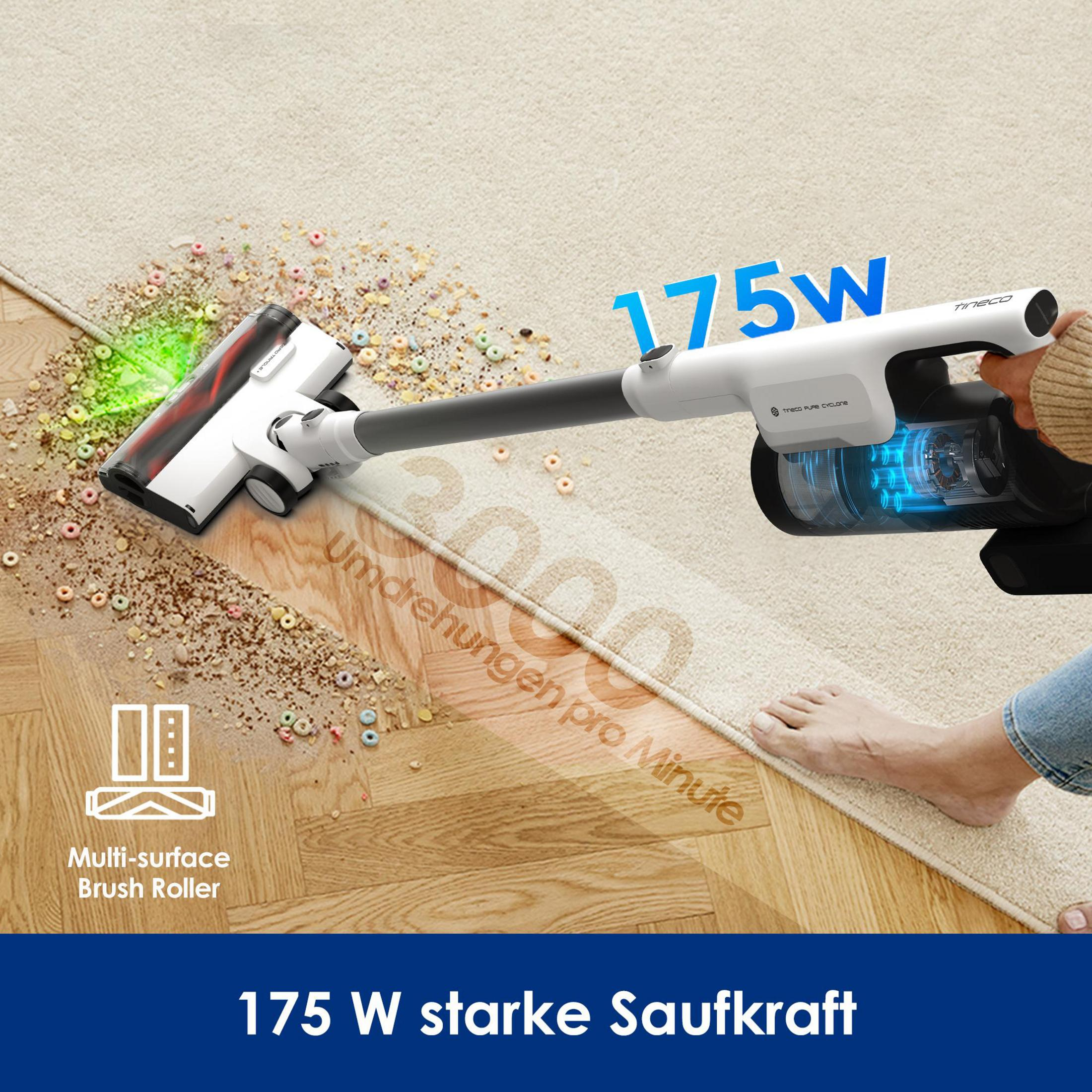 Odkurzacz czyści płatki śniadaniowe na dywanie. Odkurzacz jest biały, ma niebieskie światło i napis "175W".