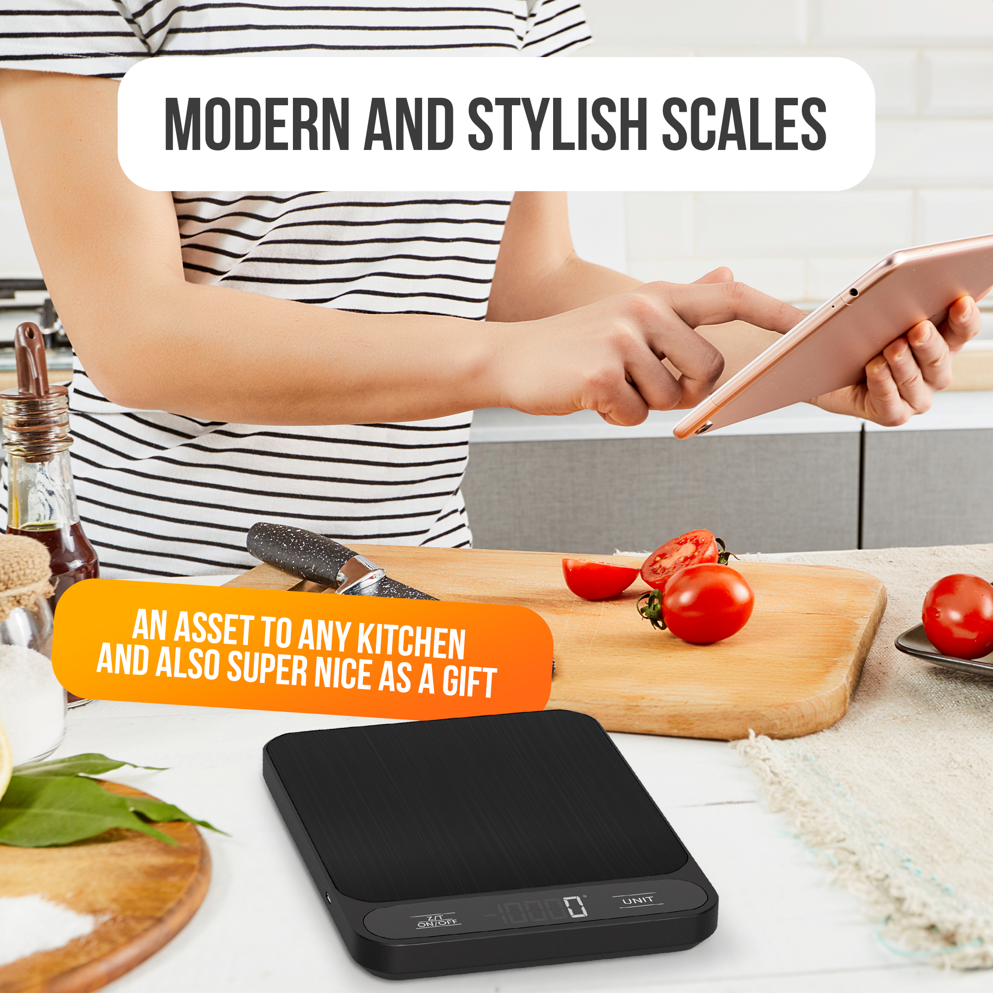 A person in a striped shirt uses a tablet near tomatoes, a cutting board, and a black kitchen scale on a white table.