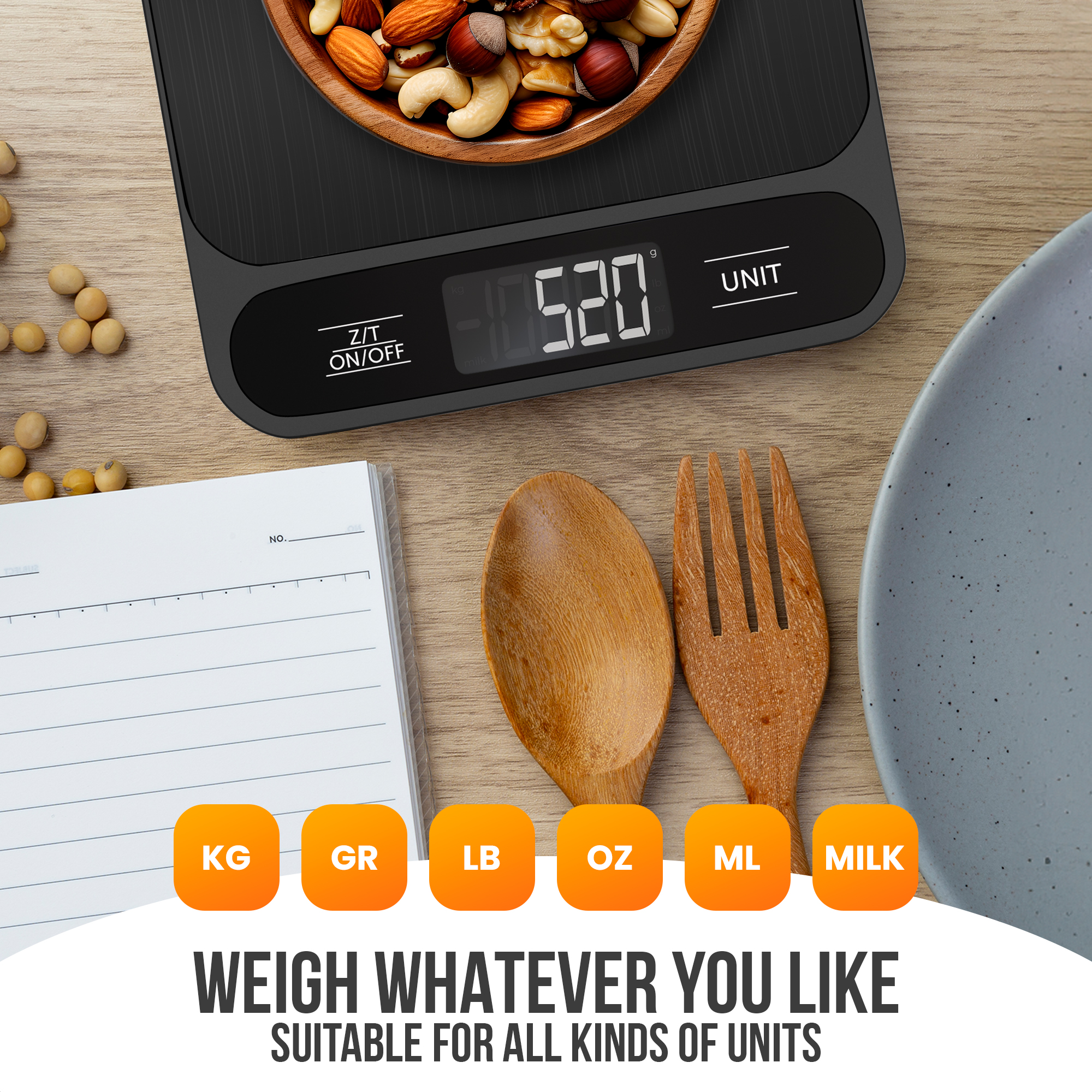 A kitchen scale with mixed nuts, a wooden spoon and fork, and a notepad. Text reads 'Weigh whatever you like'.