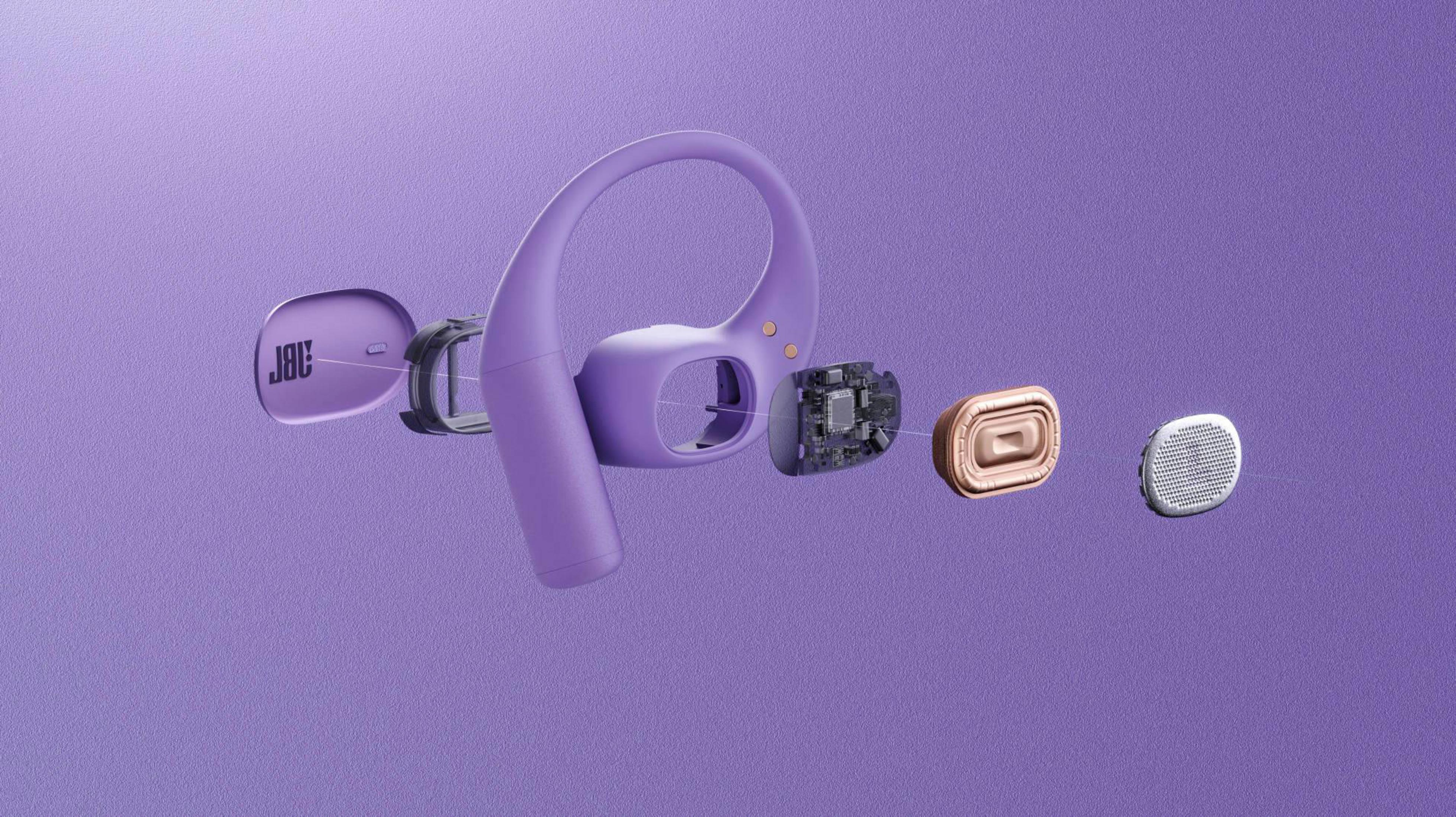 Un auricolare viola con le sue parti separate, che mostrano i componenti interni. Lo sfondo è di colore viola uniforme.