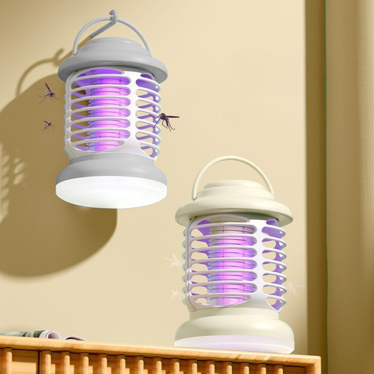 Zwei Mückenfänger mit violettem Licht an einer beigen Wand. Insekten fliegen in der Nähe der Zapper, eines ist auf dem Zapper.