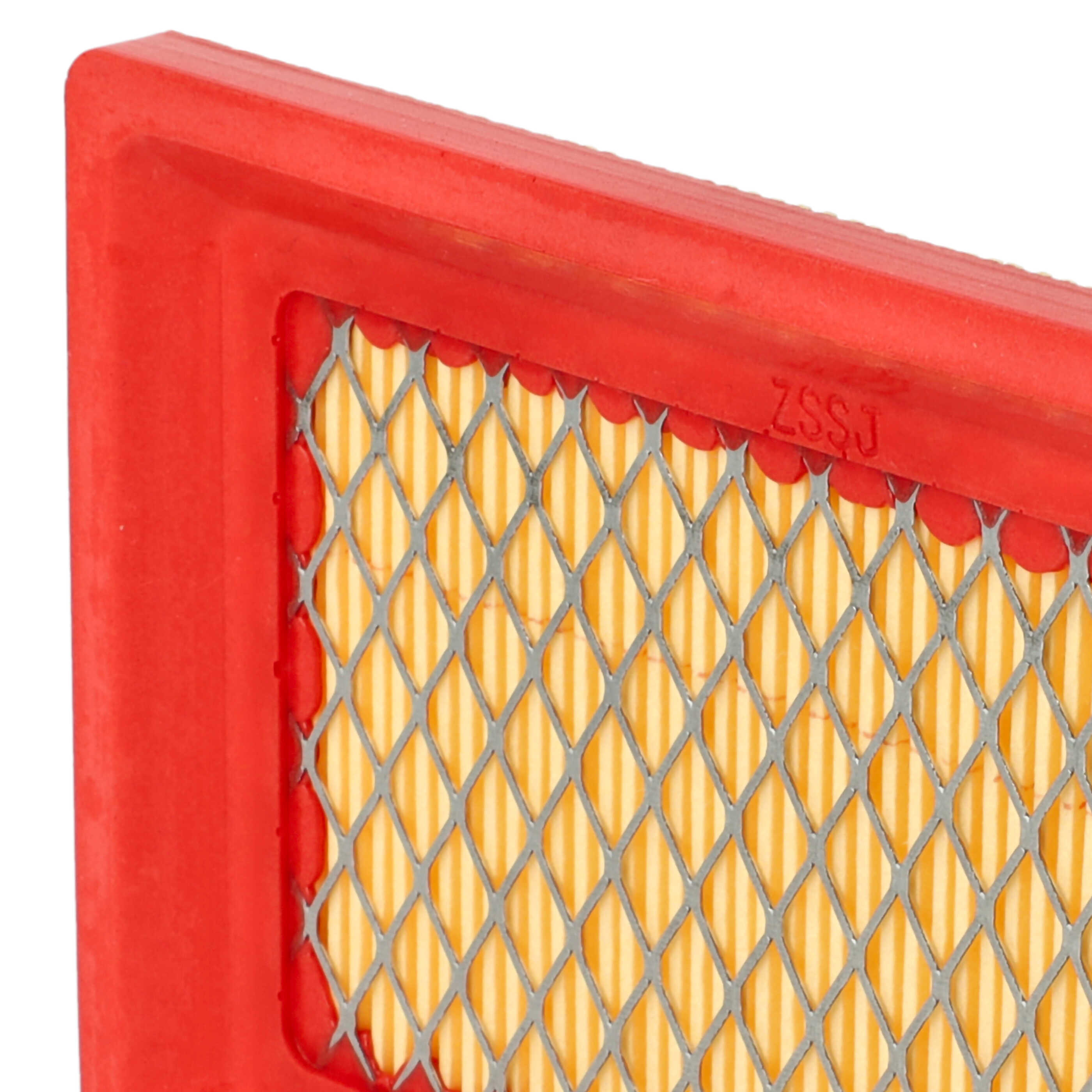 Nahaufnahme eines Luftfilters. Er hat einen roten Rahmen, einen gelb-weißen Filter und ein Metallgitter.