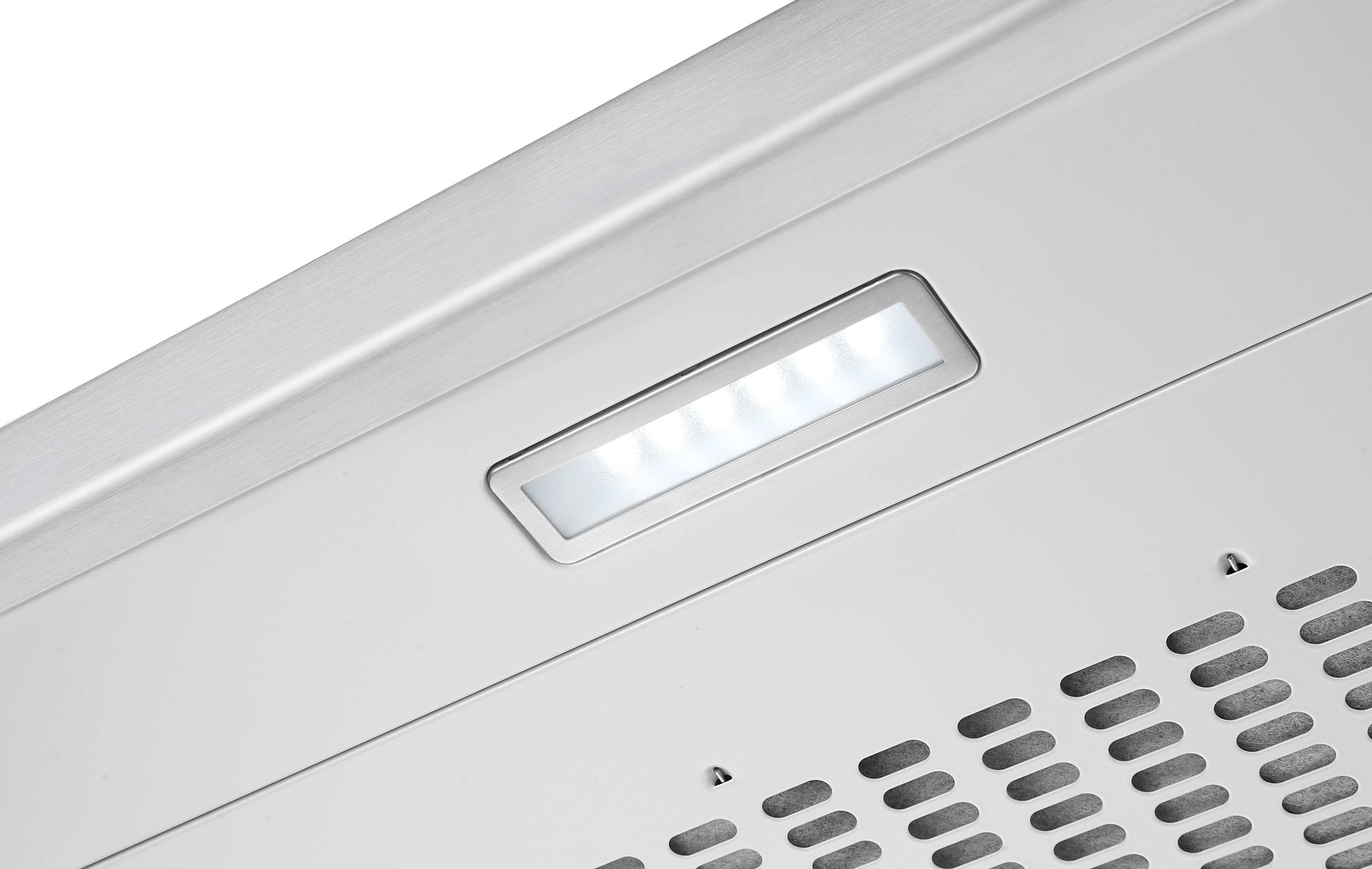 Close-up van een witte afzuigkap. Een rechthoekig licht brandt en een ventilatierooster bevindt zich rechtsonder.