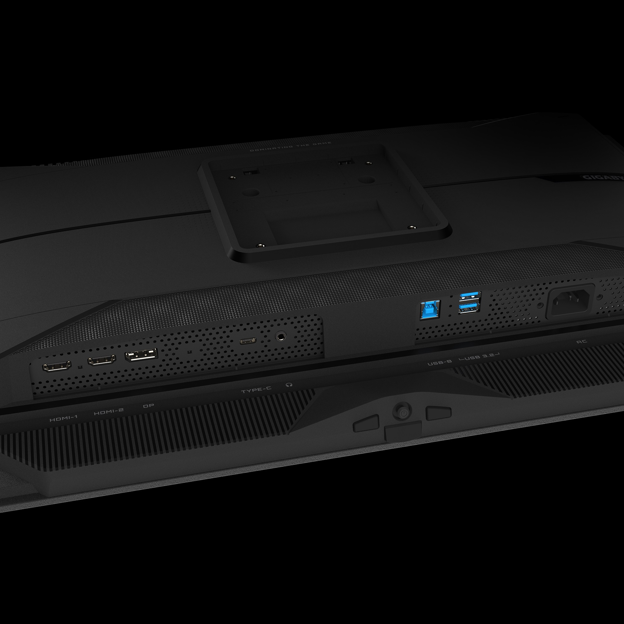 Tył czarnego monitora z portami: HDMI, DP, USB i zasilaniem. Widoczna jest marka GIGABYTE.