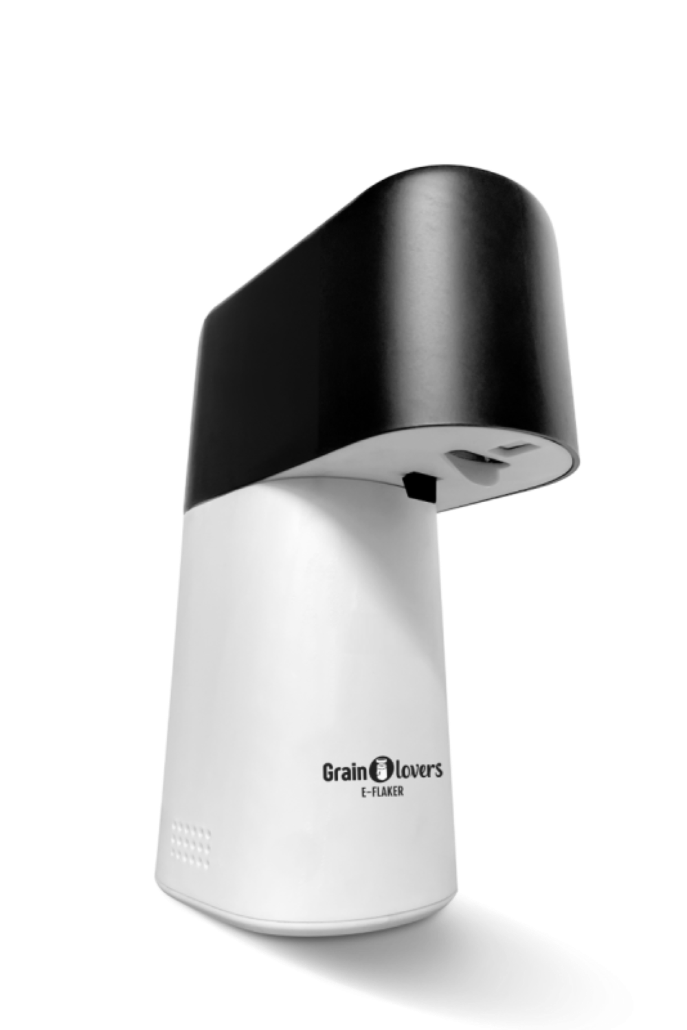 Ein Grain Lovers E-FLAKER, weißer Sockel und schwarzer Deckel. Es befindet sich auf einem schwarzen Hintergrund mit Schatten.