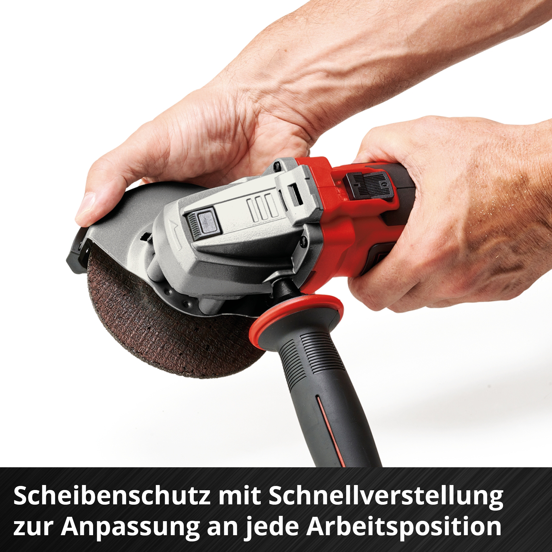Hände halten einen Winkelschleifer, rot und schwarz, mit einer Schleifscheibe. Der Text lautet: Scheibenschutz mit Schnellverstellung.