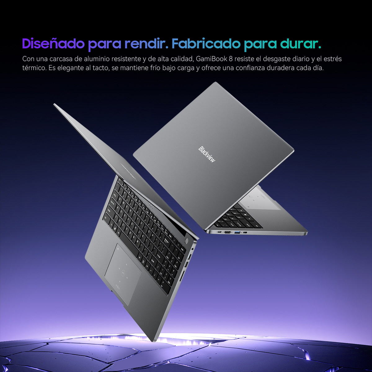 Dos portátiles Blackview grises se muestran en ángulo. El portátil delantero está abierto, mostrando el teclado y el panel táctil.