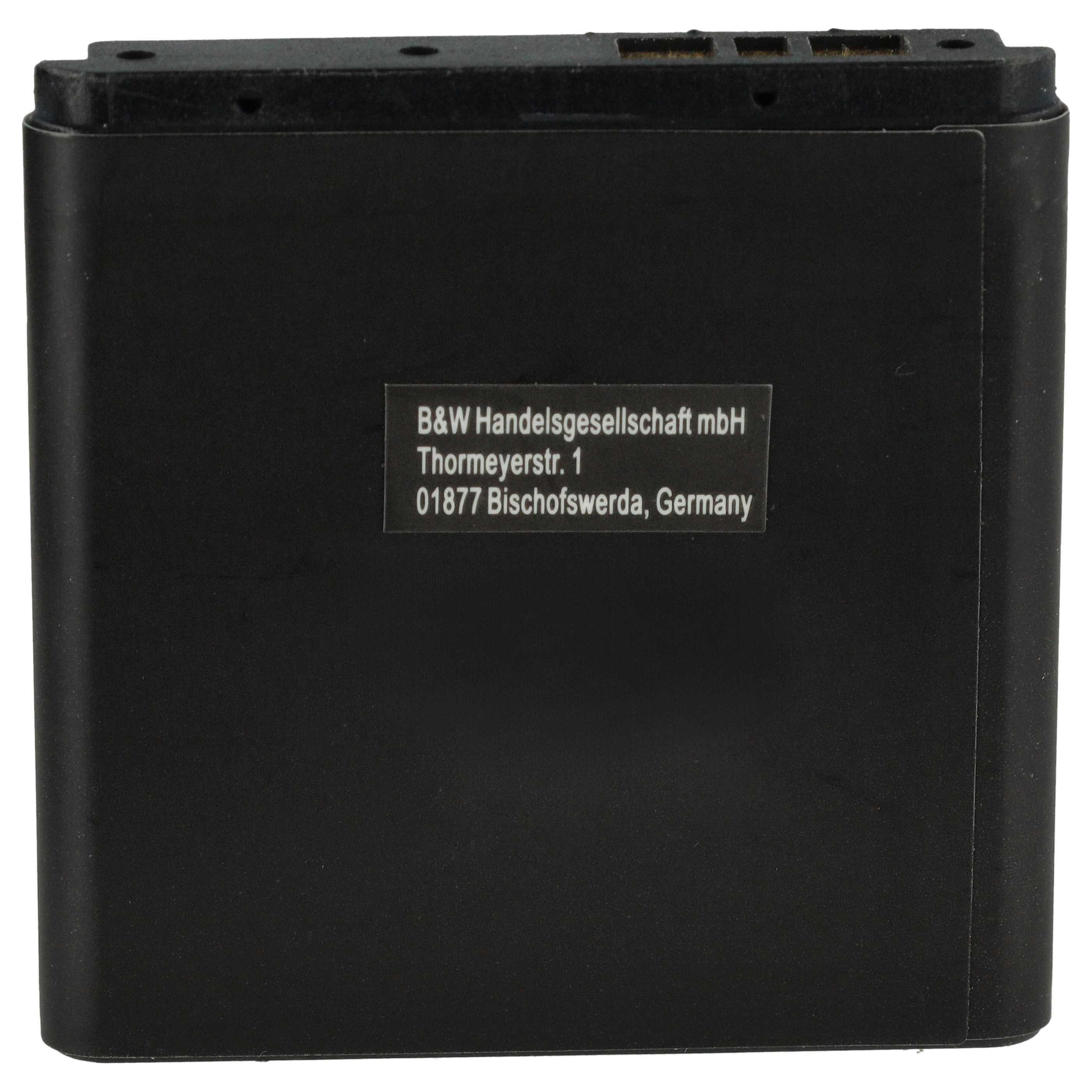 Ein schwarzes rechteckiges Gerät mit weißem Etikett. Das Etikett trägt den Text: B&W Handelsgesellschaft mbH, Adresse und Deutschland.