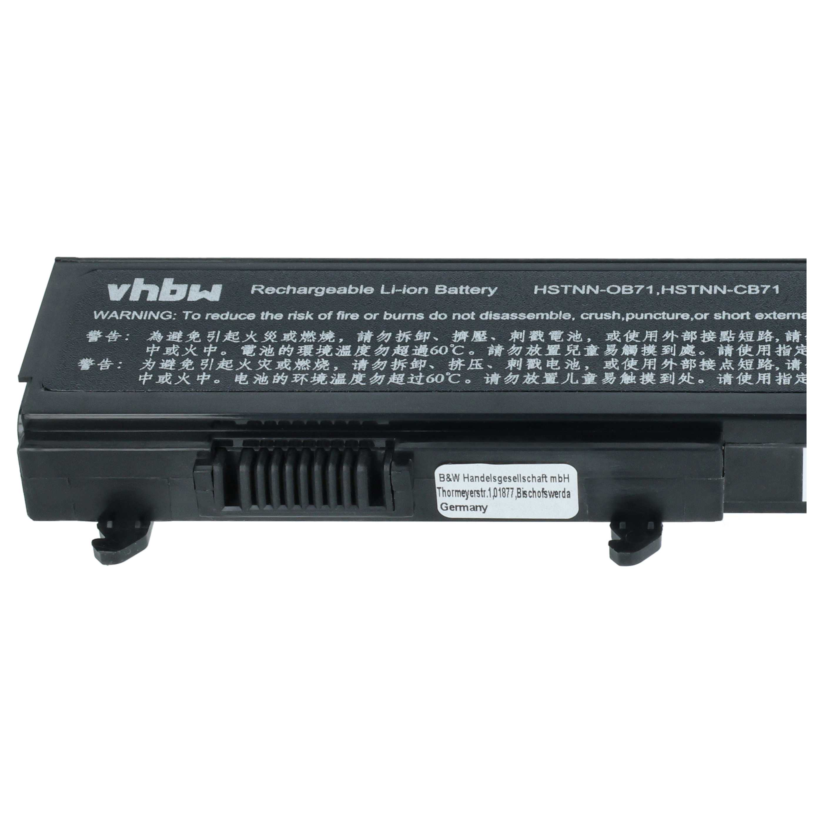 Ein schwarzer Laptop-Akku mit Warnhinweis und der Marke 'vhbw'. Der Akku hat ein Etikett mit der Adresse des Herstellers.