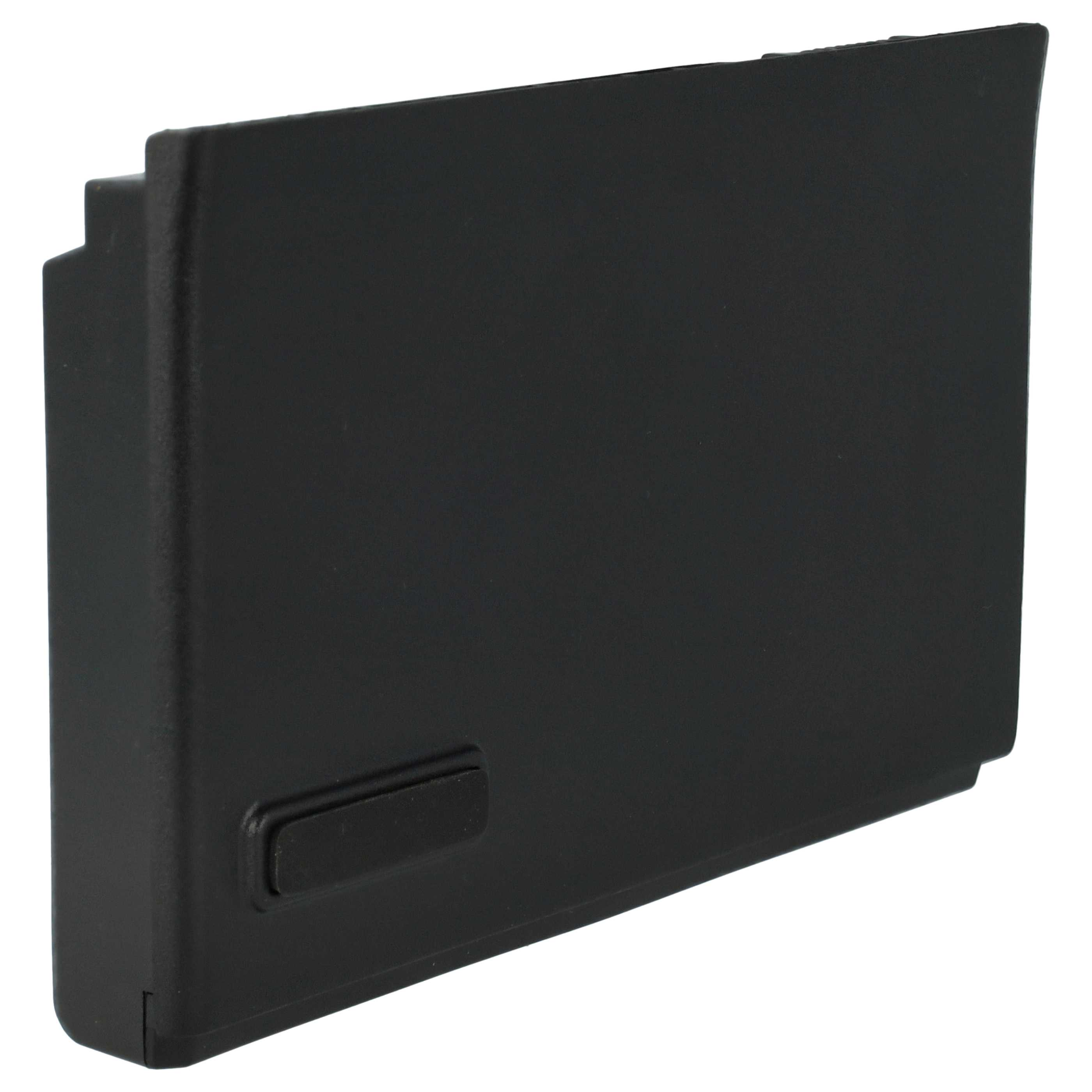 Eine schwarze Kunststoffkomponente mit rechteckiger Form und einem kleinen, vertieften rechteckigen Knopf.