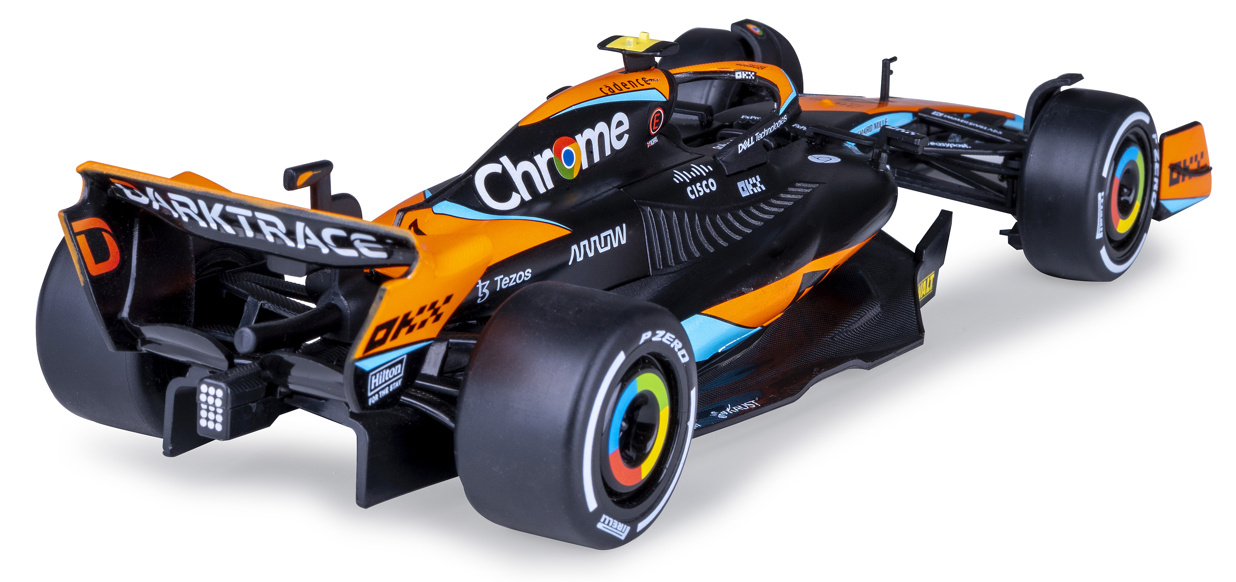 Ein McLaren F1-Automodell in Schwarz und Orange. Es hat Sponsorenlogos wie Chrome, Darktrace und Tezos. Die Reifen haben mehrfarbige Ringe.
