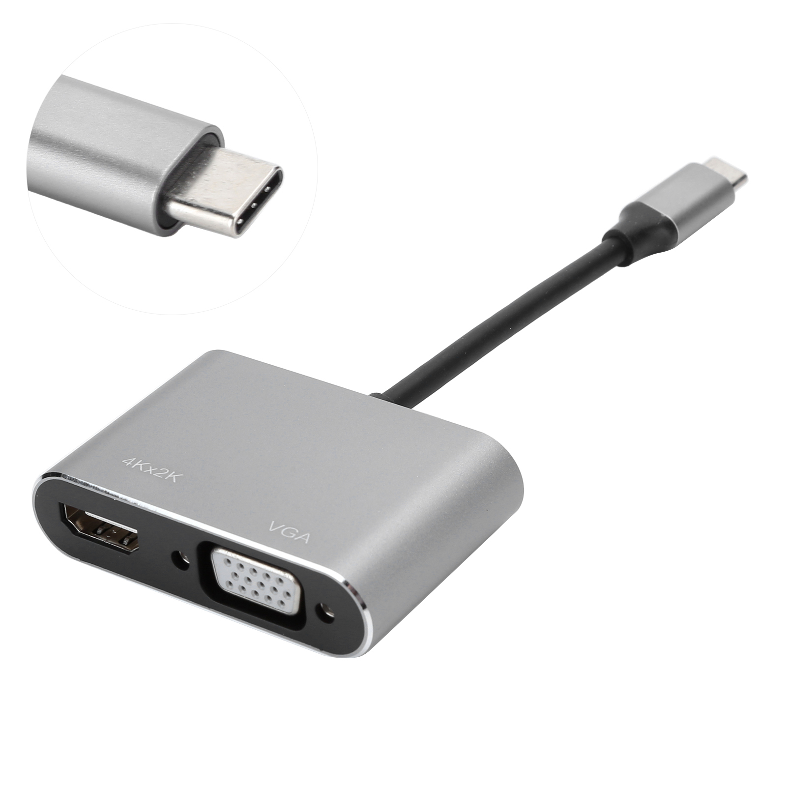 Silberner USB-C-Adapter mit HDMI- und VGA-Anschlüssen. Enthält eine Nahaufnahme eines USB-C-Anschlusses. Schwarzes Kabel.
