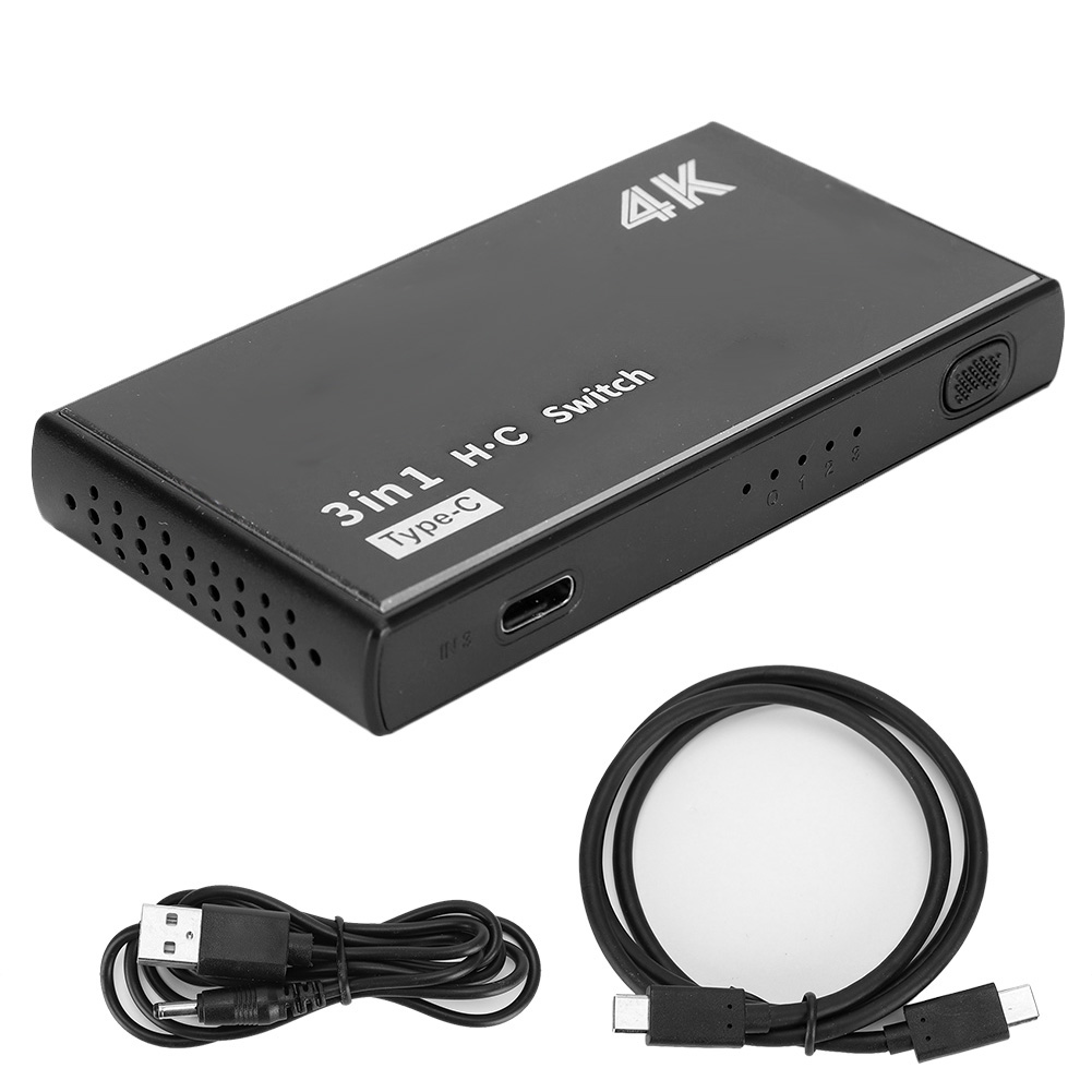 Ein schwarzer 4K 3in1 H-C Switch mit Typ-C-Anschluss, USB-Kabel und USB-C-Kabel auf weißem Hintergrund.