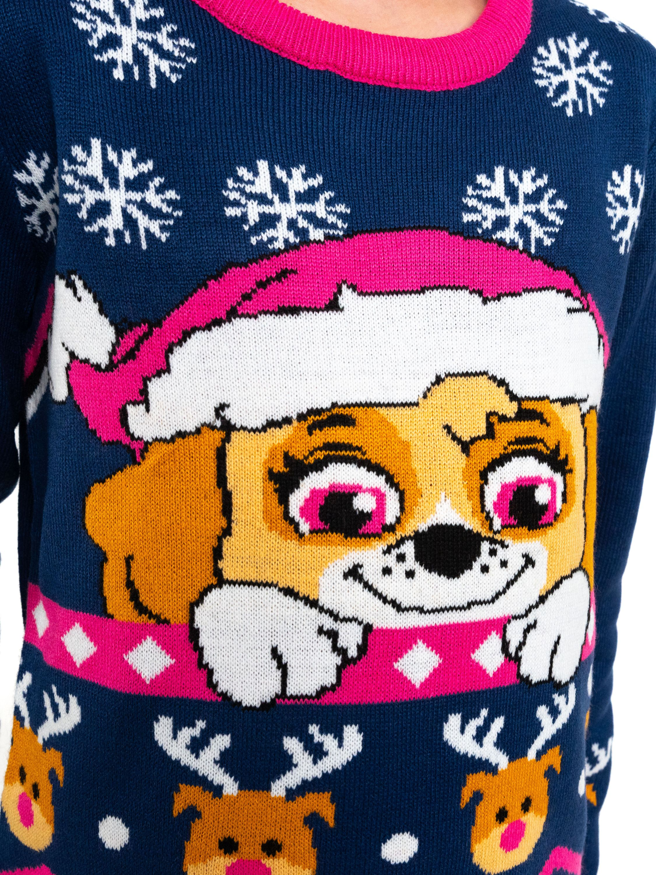 Blauer Pullover mit Paw Patrol-Design mit Skye in rosa Hut, Schneeflocken und Rentier-Mustern.