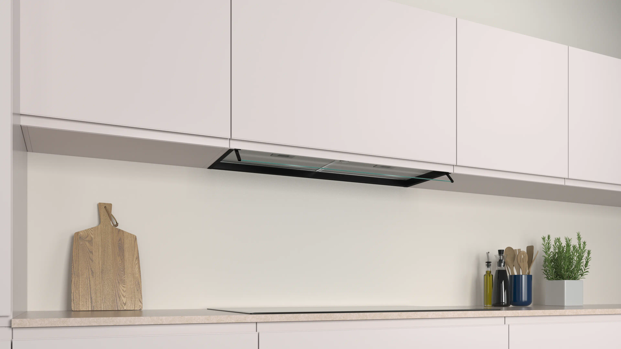 Una cocina moderna con armarios blancos, una campana extractora, una tabla de cortar de madera y una placa de cocina. También hay aceite de oliva y hierbas.