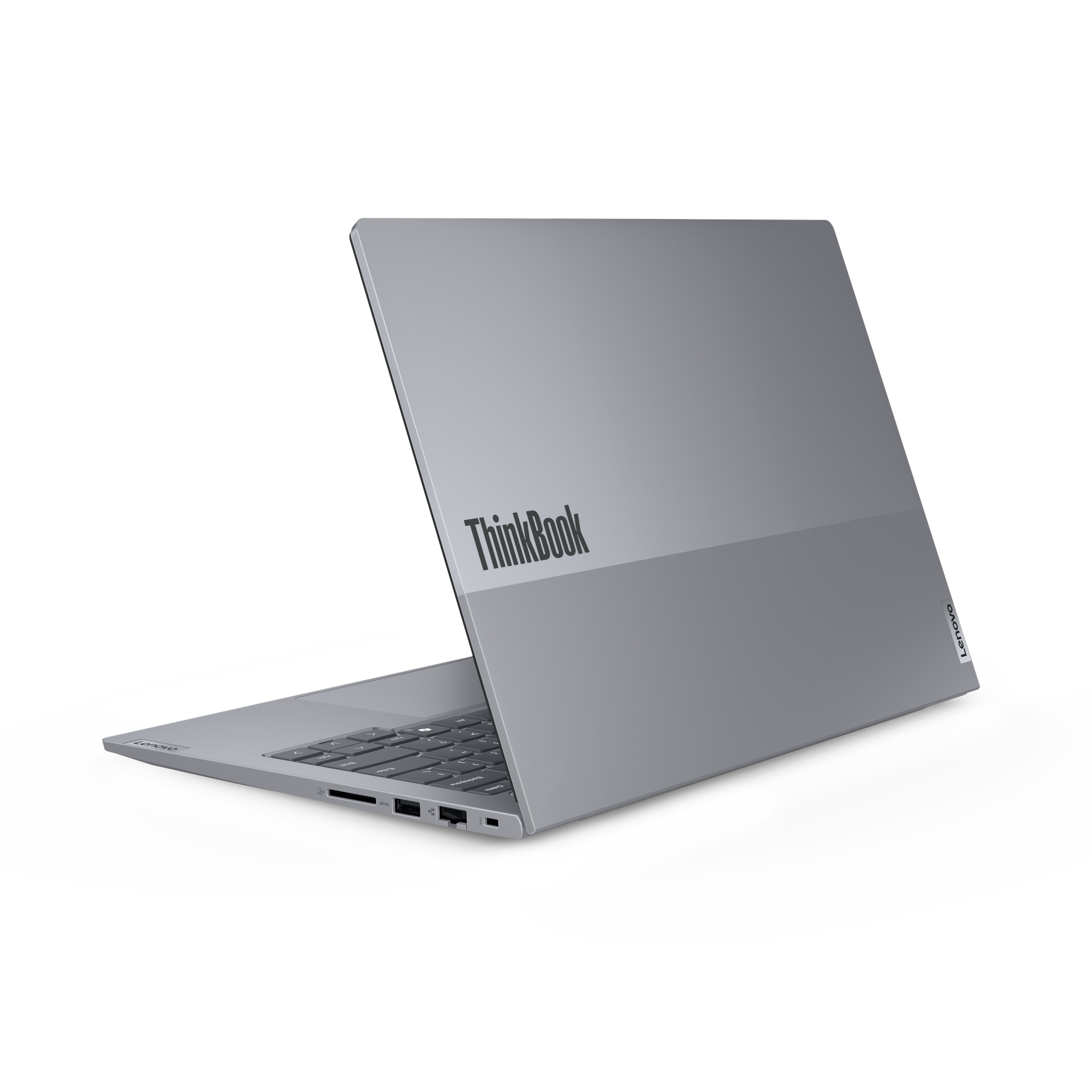 Un laptop Lenovo ThinkBook grigio è leggermente aperto, mostrando la tastiera e il logo ThinkBook.