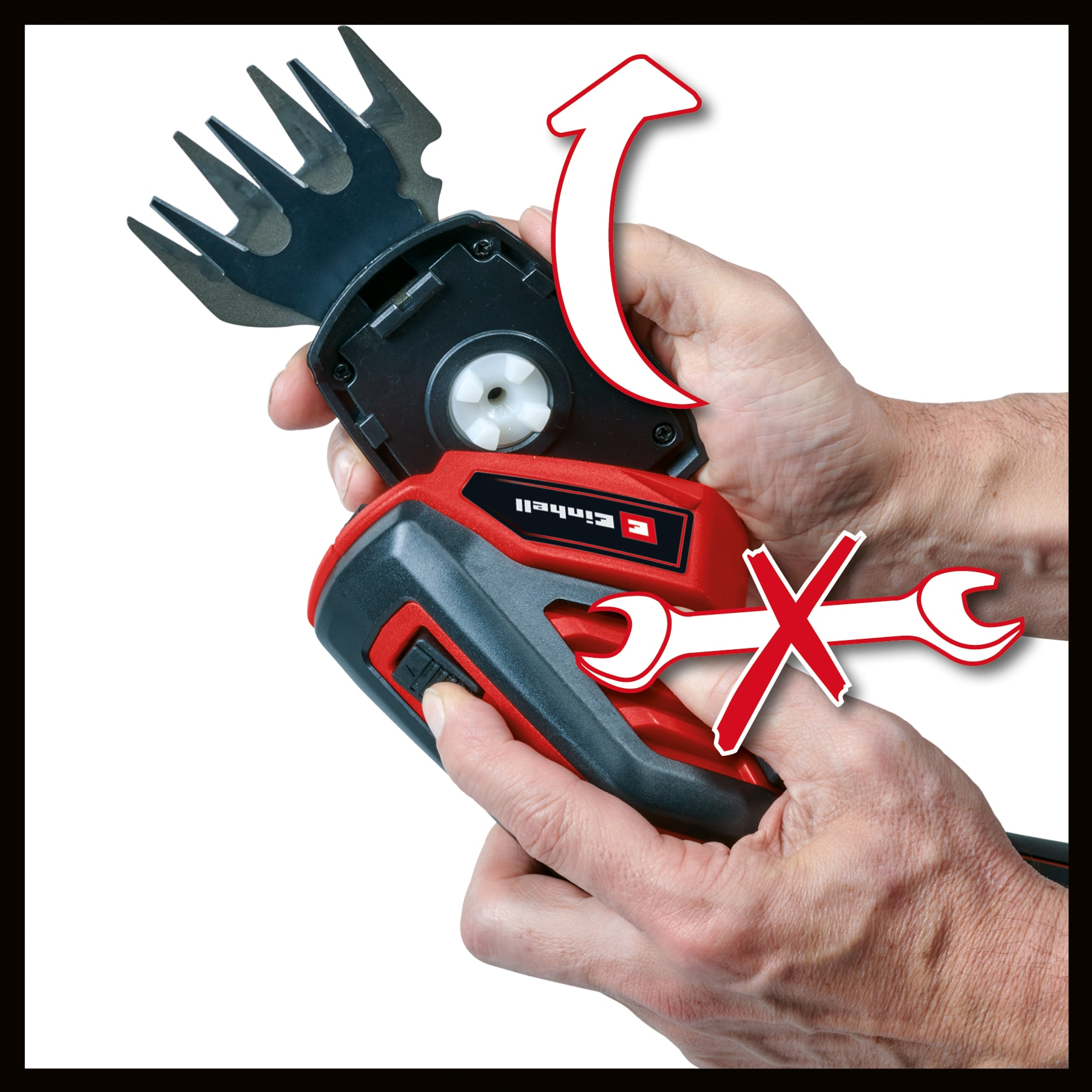 Ręce trzymające czerwono-czarną elektryczną trymer. Strzałka i klucz z czerwonym krzyżem są nałożone na obraz.