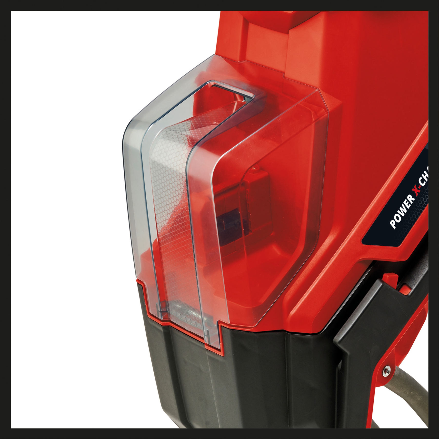 Nahaufnahme einer rot-schwarzen Maschine mit transparentem Kunststoffteil. Die Maschine hat ein 'Power X-Change'-Etikett.