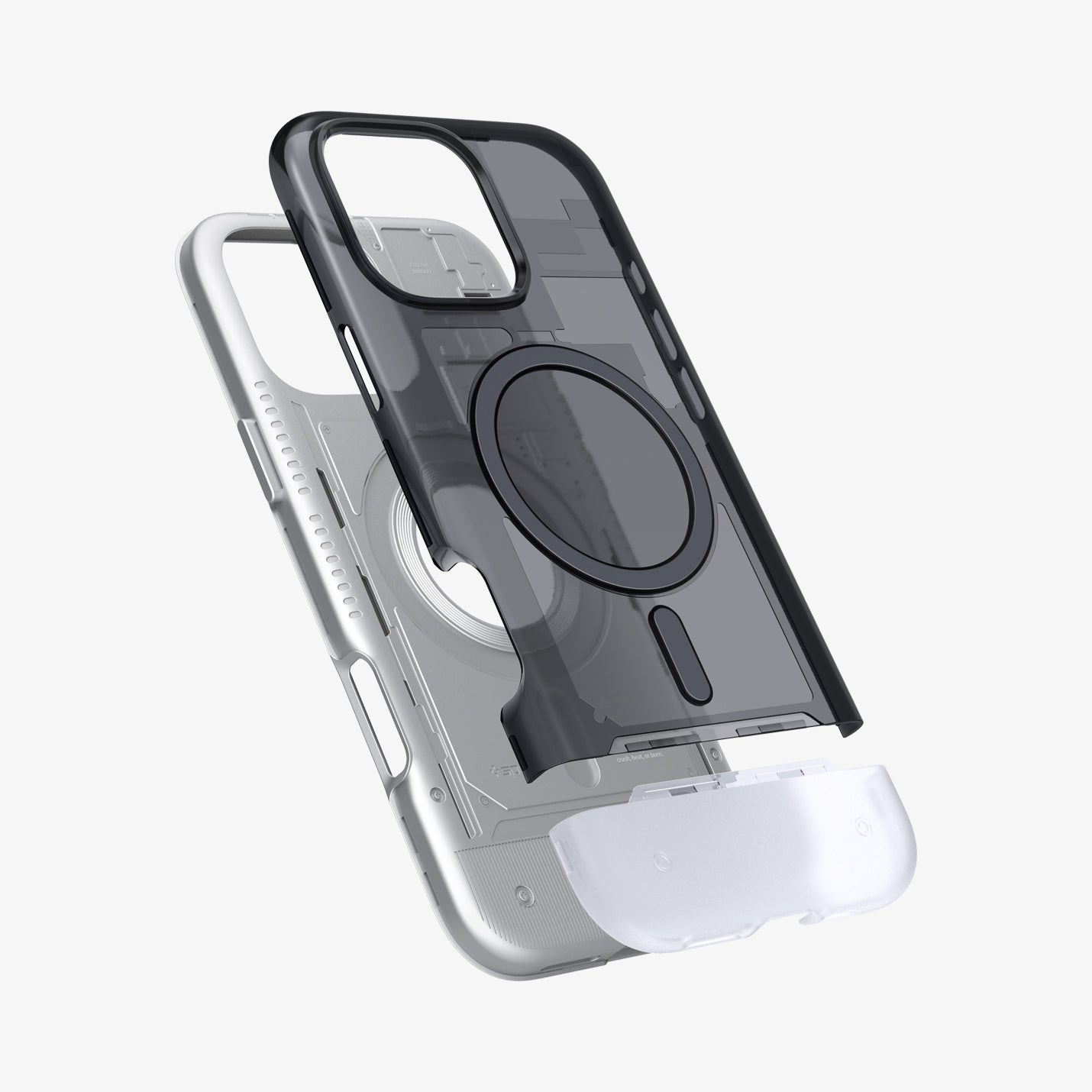 Custodia trasparente per telefono in parti. Plastica grigia e nera. La parte superiore è nera con un cerchio. La parte inferiore è grigio metallizzato.